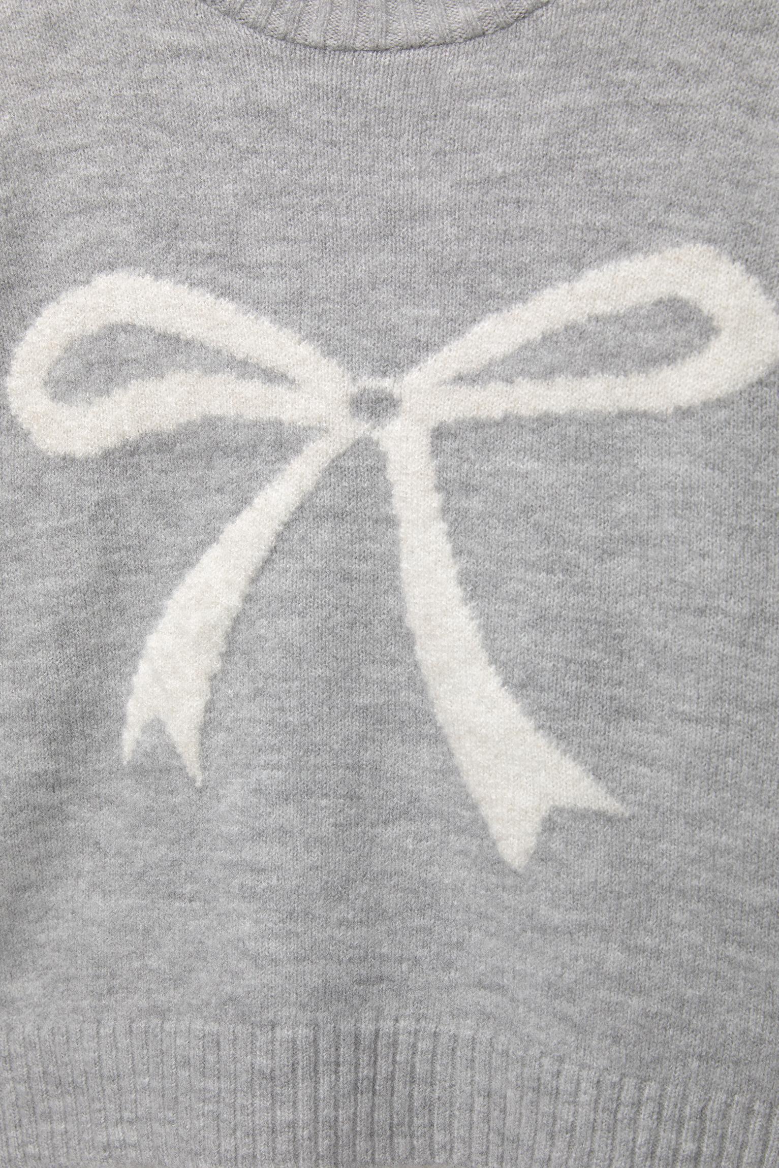 Graphic knit sweater with bow Product Image