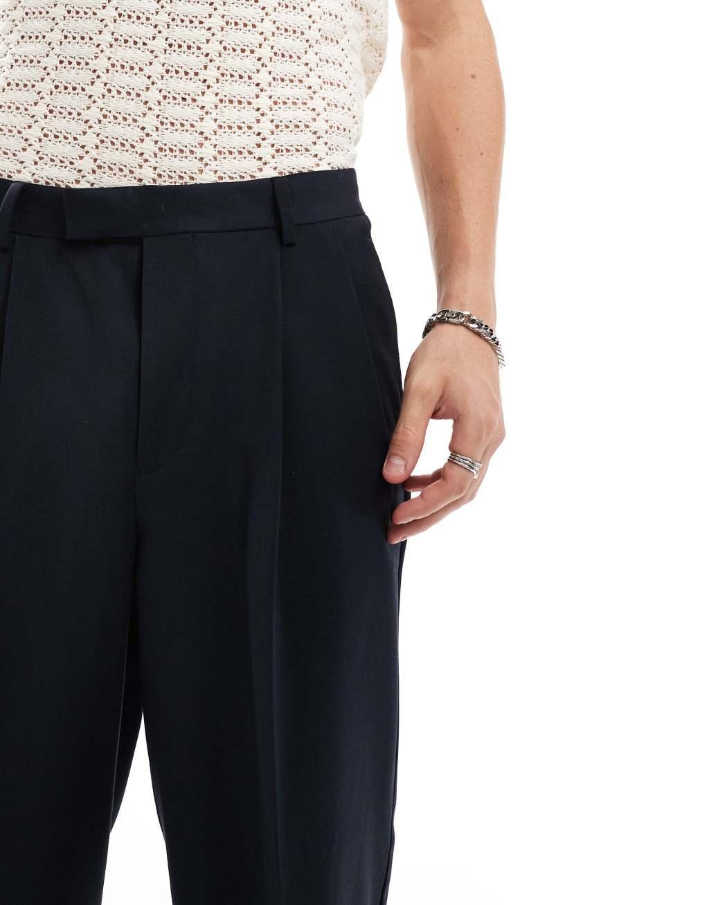 ASOS DESIGN oversized tapered dress pants with double pleat in navy Product Image