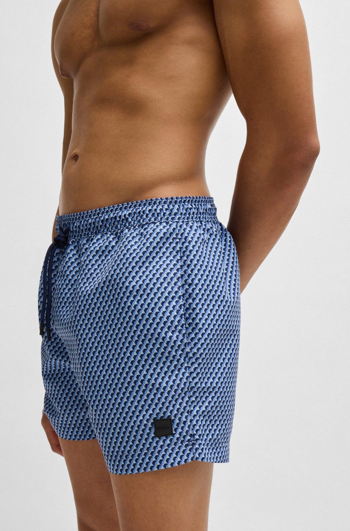 BOSS - Drawstring-waist swim shorts with all-over print - Blue Product Image