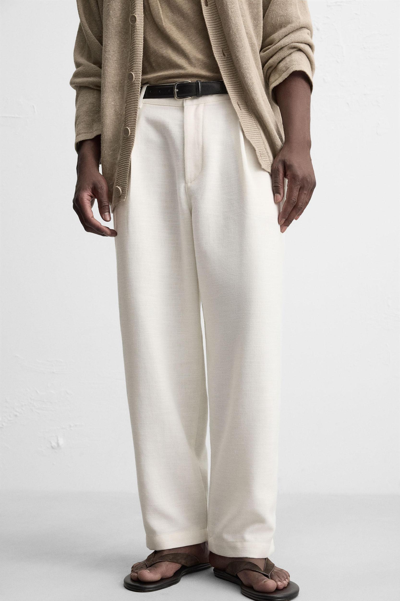 PLEATED RELAXED FIT PANTS Product Image