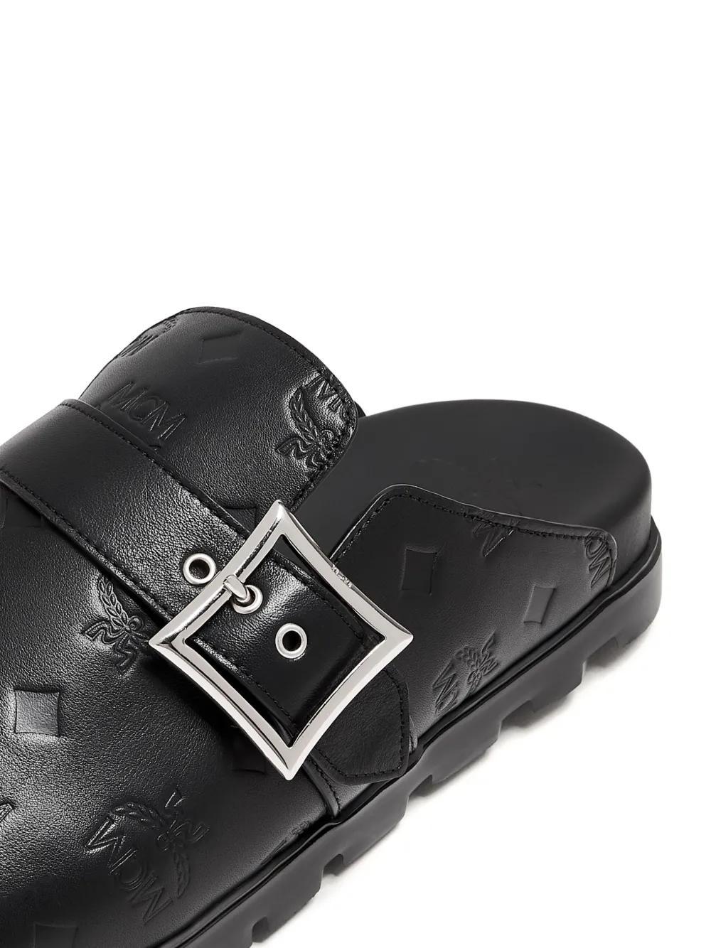 monogram leather flat mules Product Image