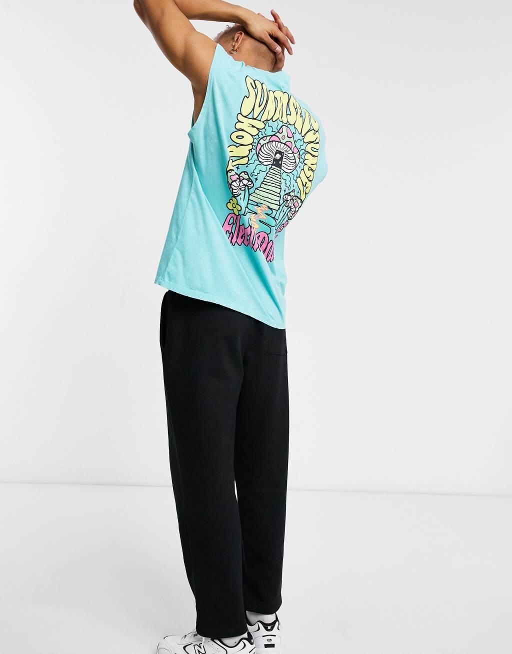 ASOS DESIGN oversized tank in washed blue with skate back print Product Image