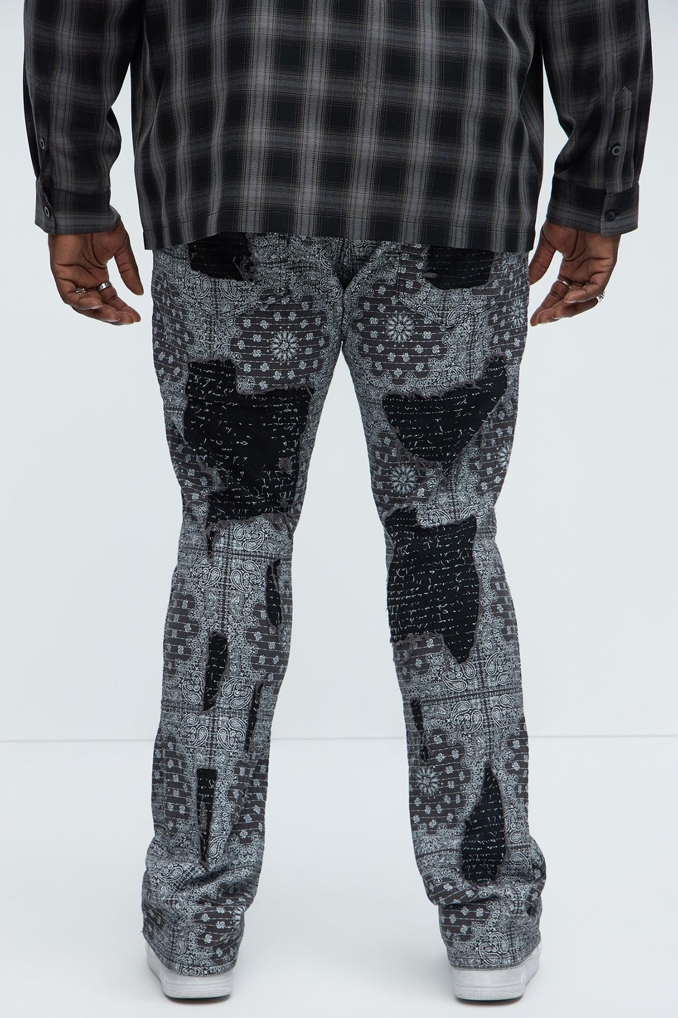 Shredded Shock Distressed Stacked Skinny Flare Jeans - Black Product Image