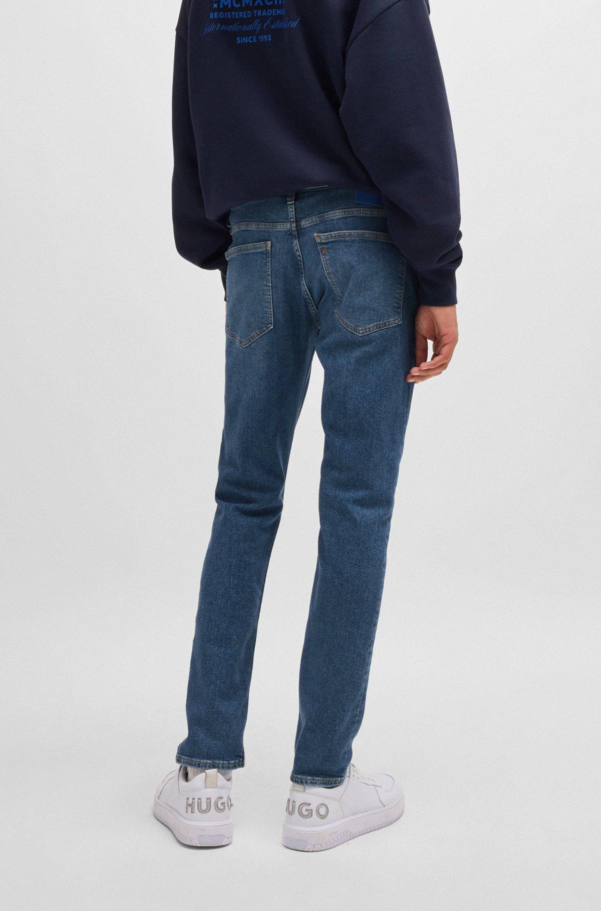 Extra-slim-fit jeans in navy stonewashed stretch denim Product Image