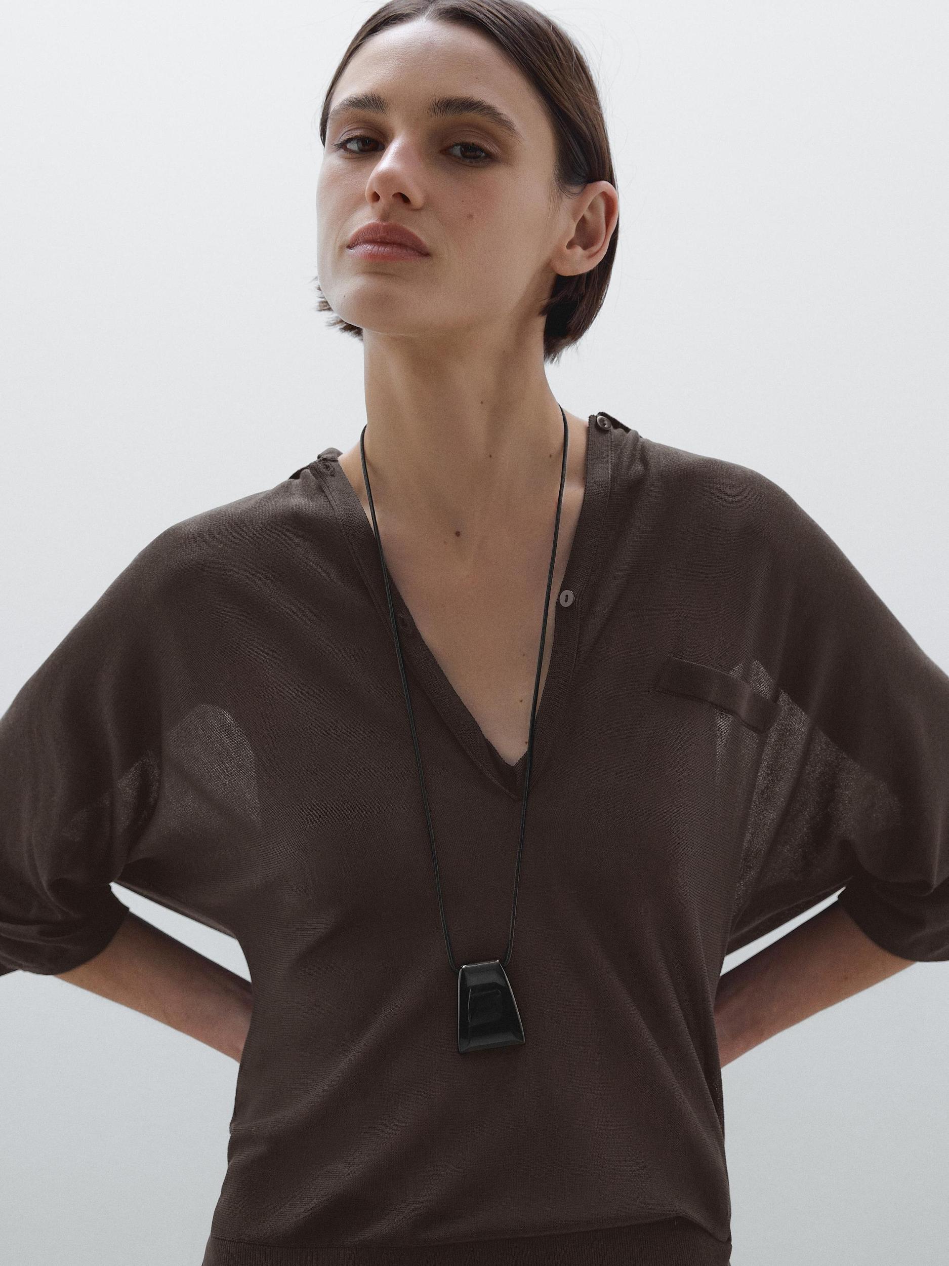 Flowing cape-style polo shirt Product Image