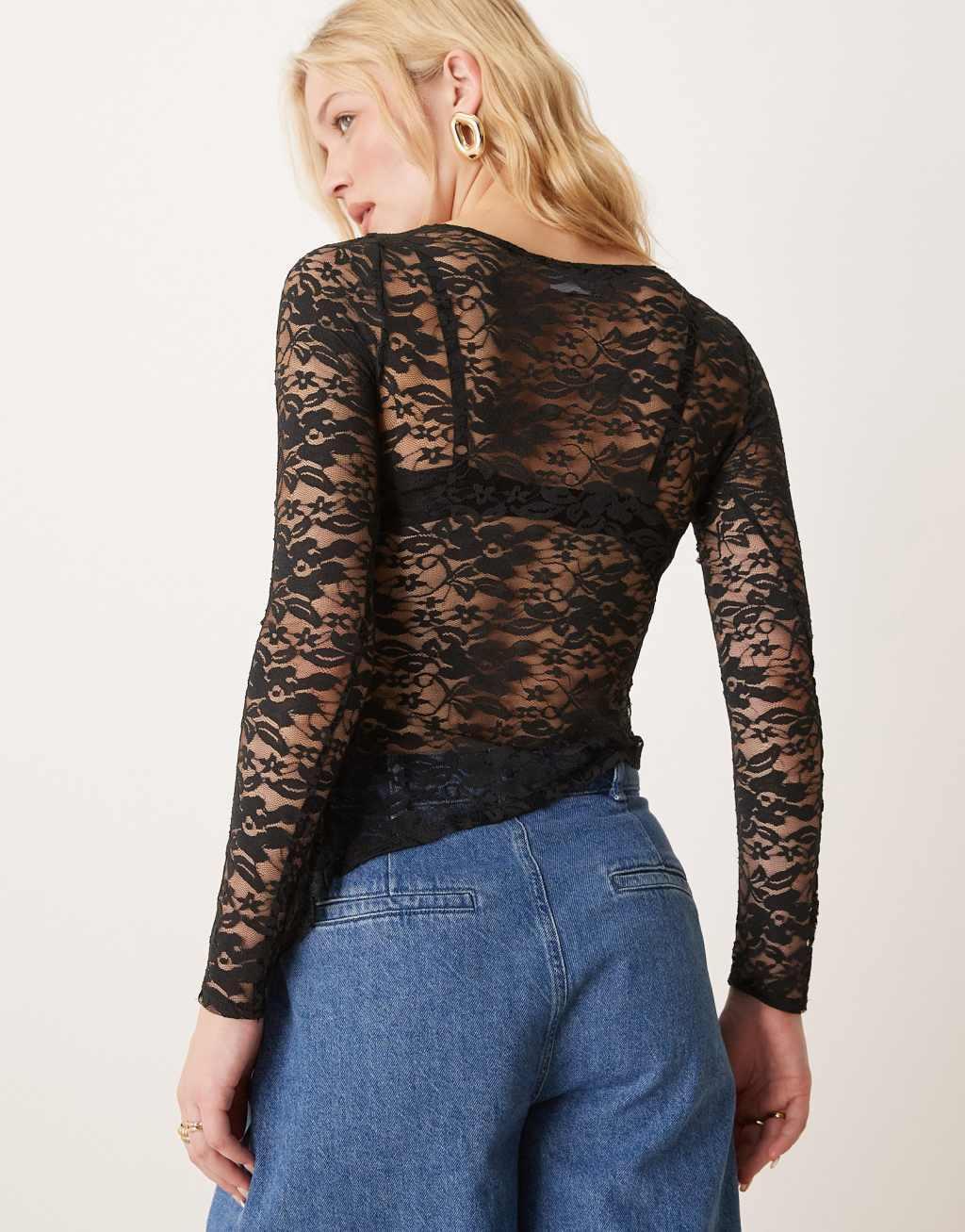 ASOS DESIGN long sleeve lace top with ruffle godet detail in black Product Image