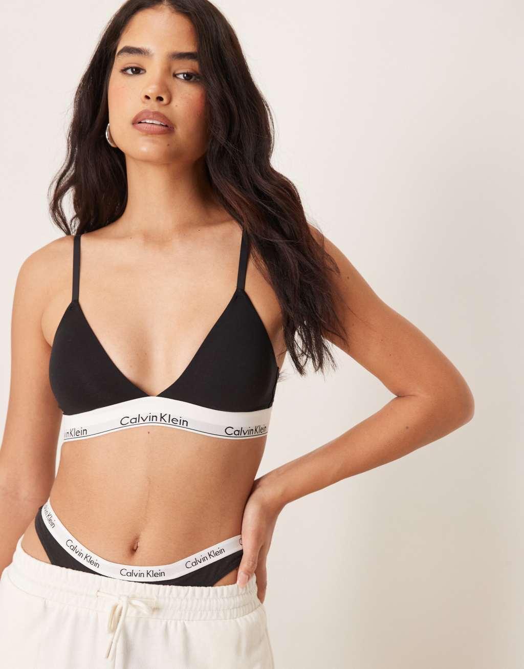 Calvin Klein modern cotton lightly lined triangle logo tape bralet in black Product Image