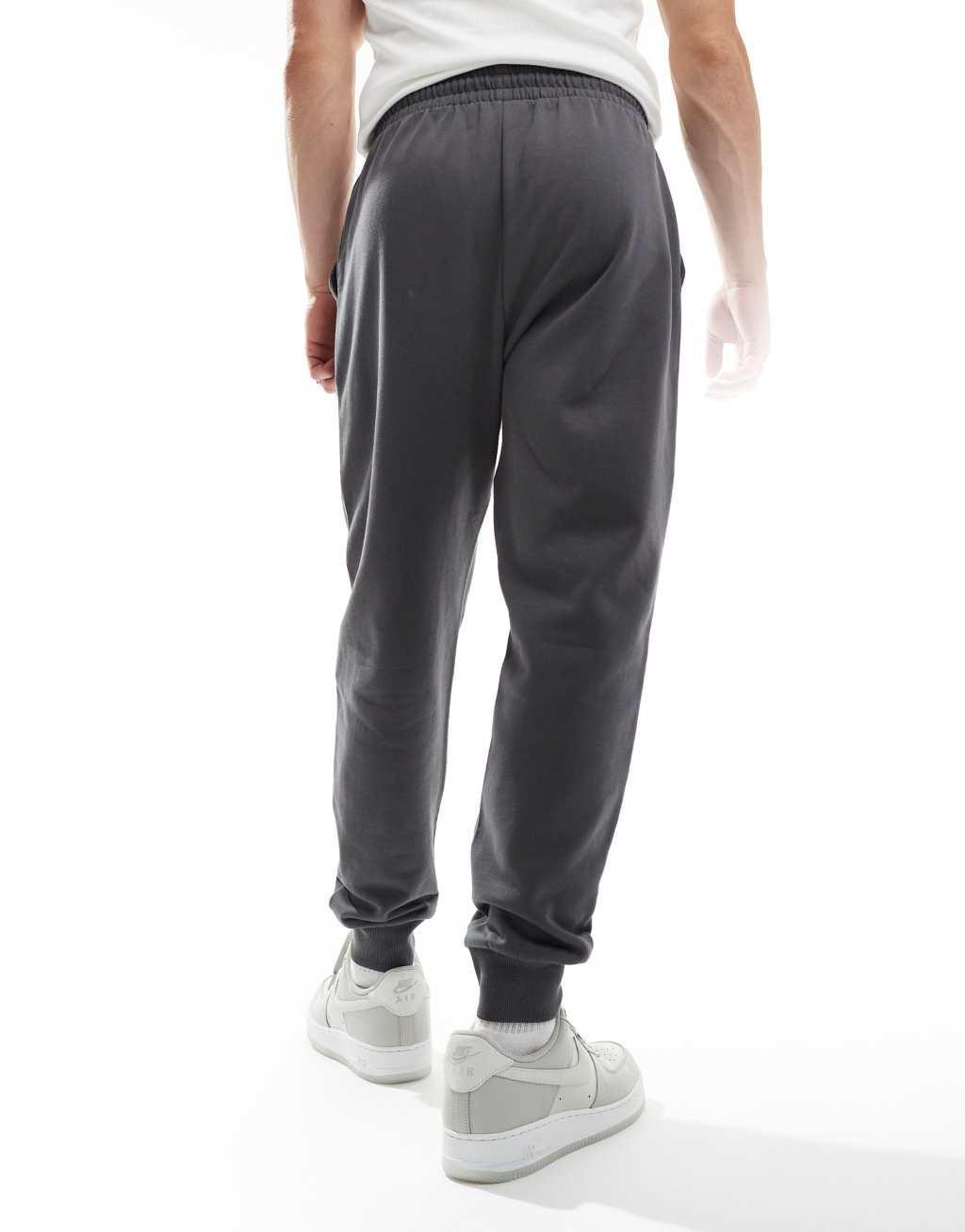 ASOS DESIGN essential tapered sweatpants in washed black Product Image