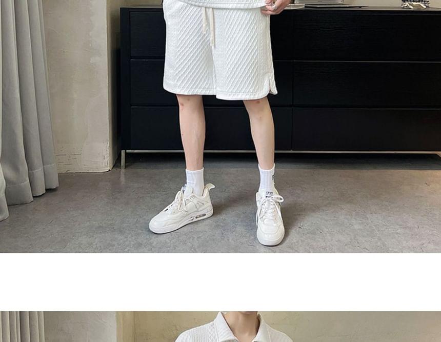 Set: Elbow-Sleeve Plain Textured Half-Zip Polo Shirt + Drawstring Waist Wide Leg Sweat Shorts Product Image