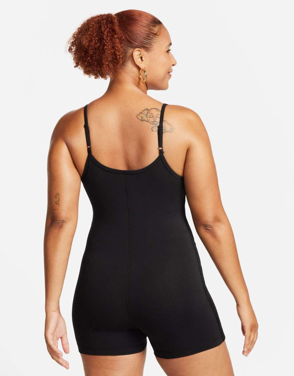 Nike one piece jumpsuit with tape detail Product Image