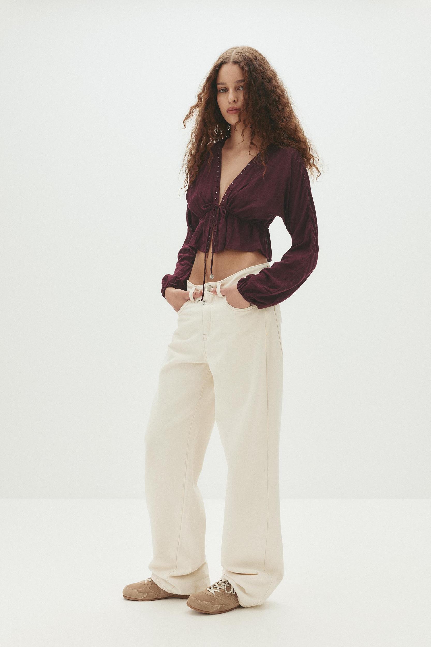 Beaded blouse with bow Product Image