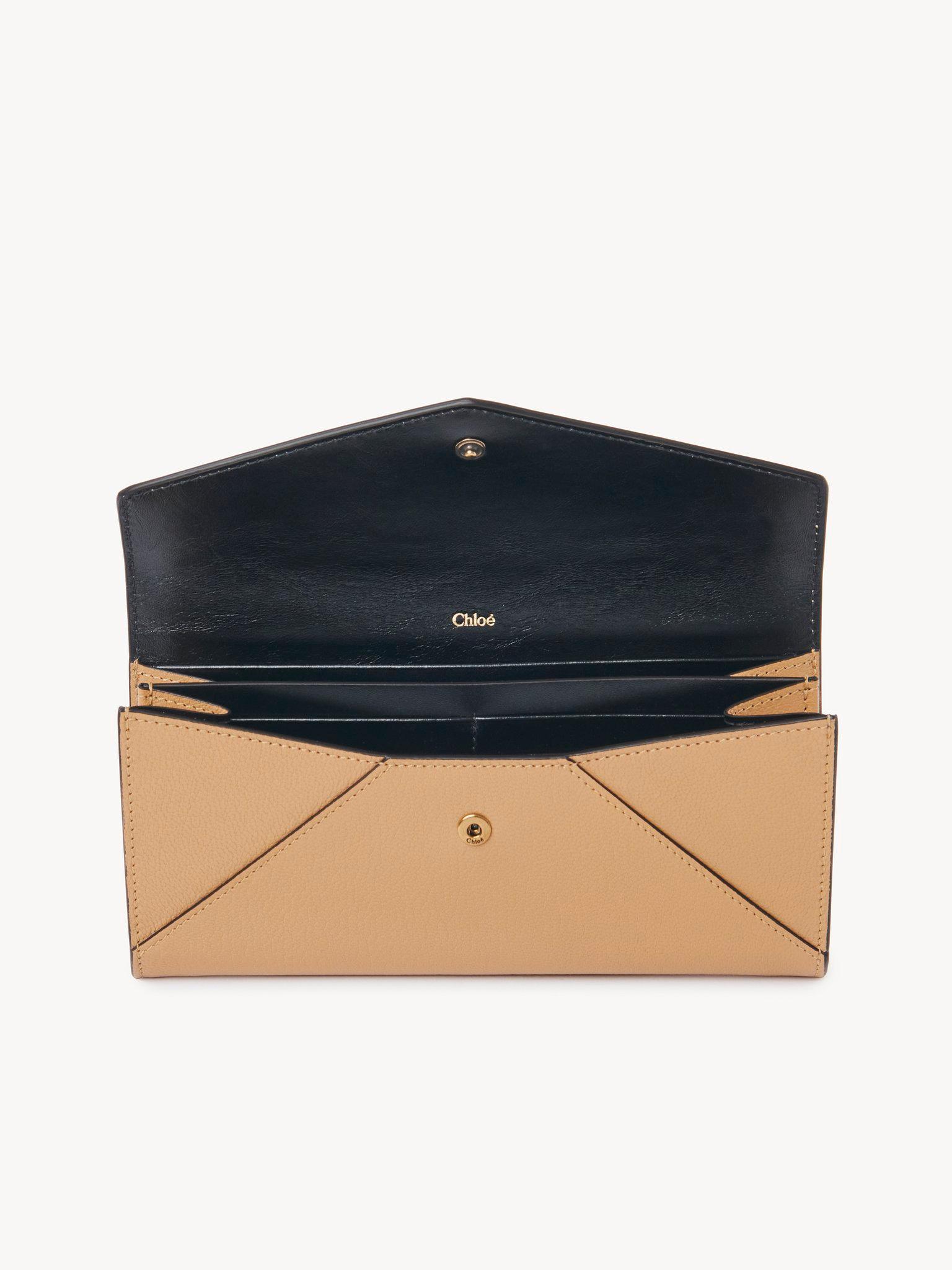 Envelope long wallet with flap in grained leather Product Image