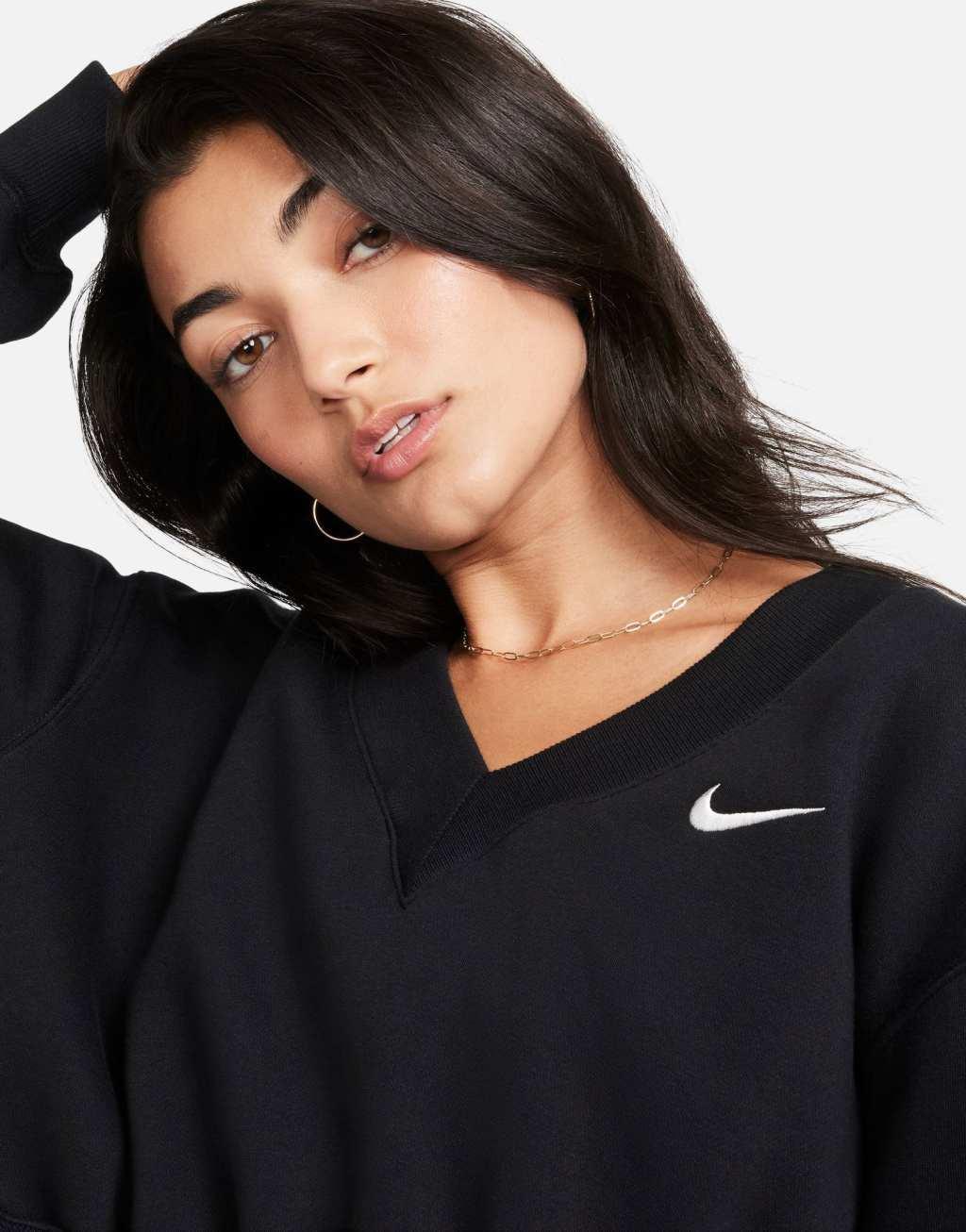 Nike mini swoosh v-neck cropped sweatshirt Product Image