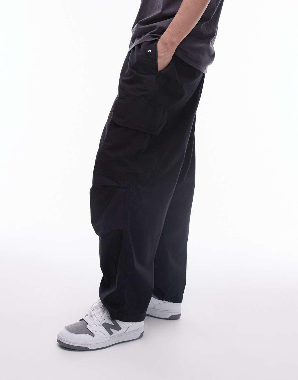 Topman wide cargo pants in black Product Image