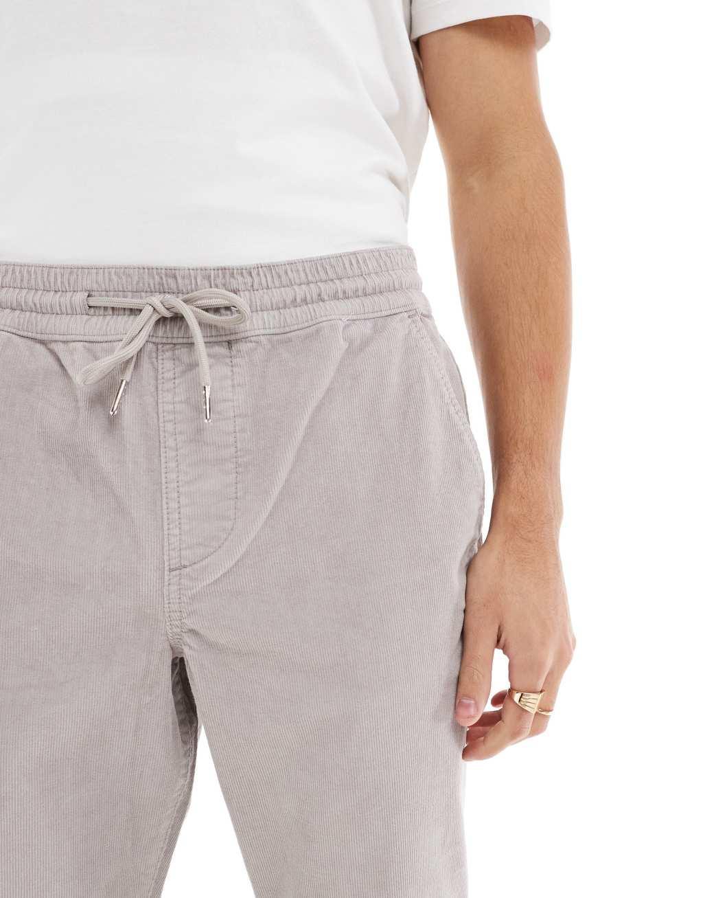 ASOS DESIGN tapered fit cord pants with elasticated waist in gray Product Image