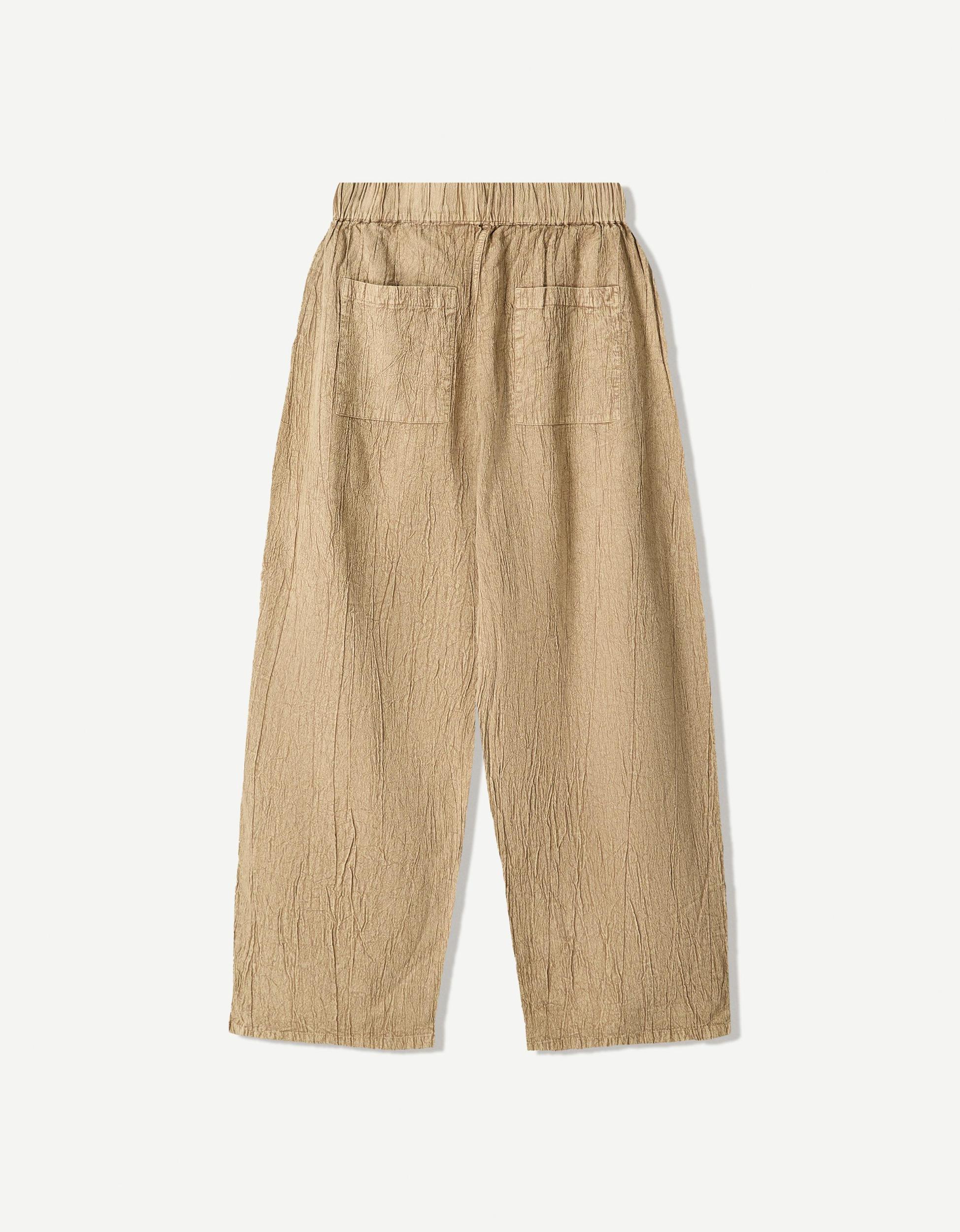 Wide-leg pleated pants Product Image
