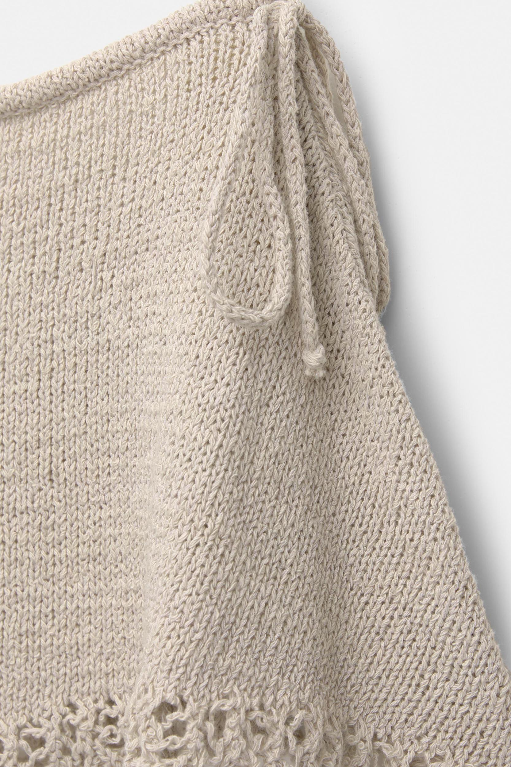 Knit mini skirt with open knit hem Product Image