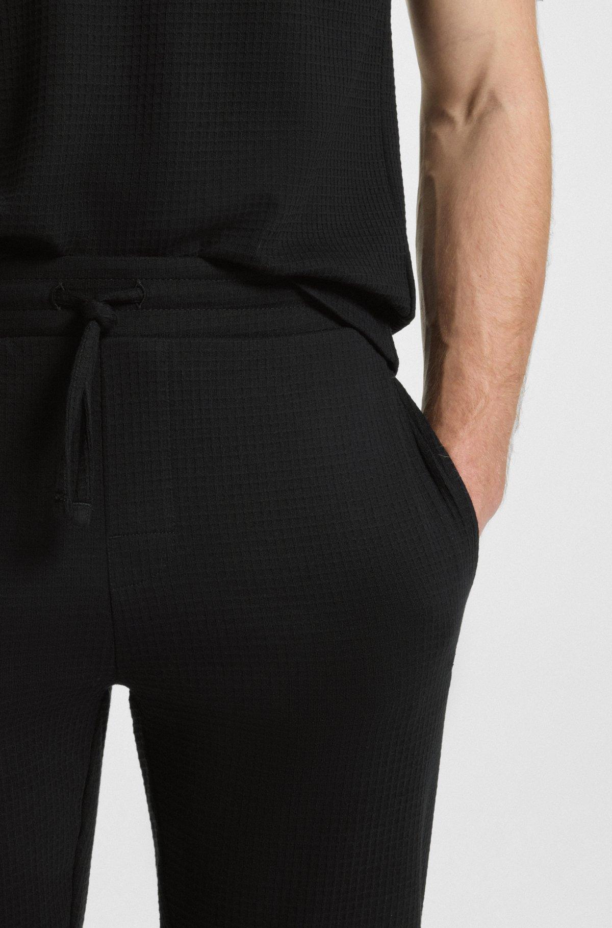 Pajama bottoms with embroidered logo Product Image