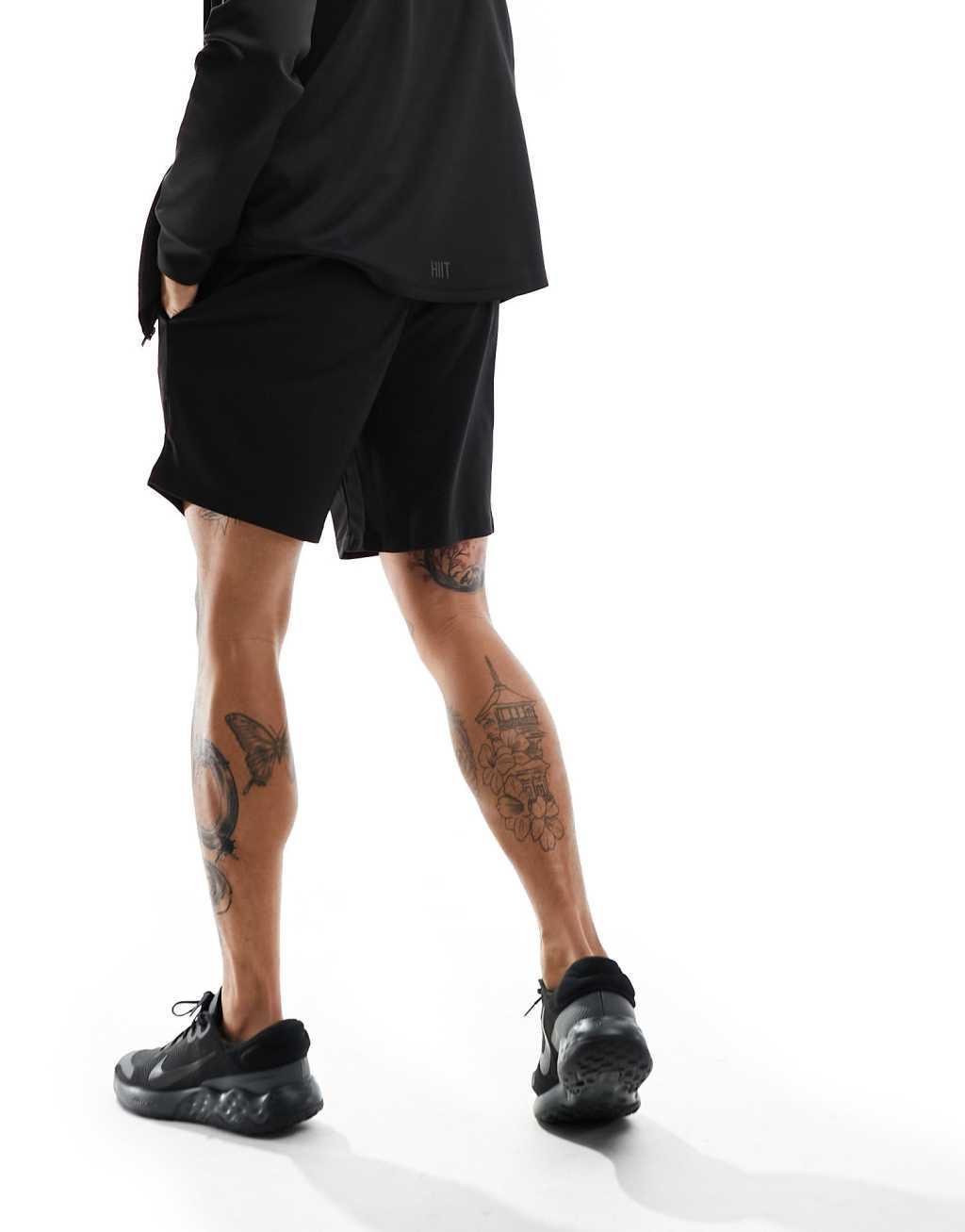 ASOS 4505 longline 10 inch shorts in mesh fabric in black Product Image