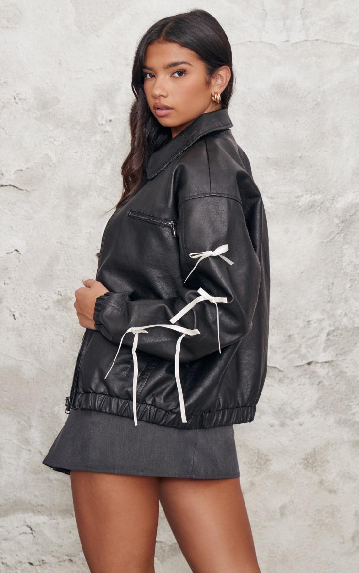 Black Faux Leather Bow Sleeve Detail Oversized Jacket Product Image