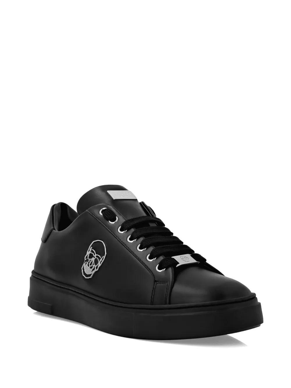 Skull-appliqué leather sneakers Product Image