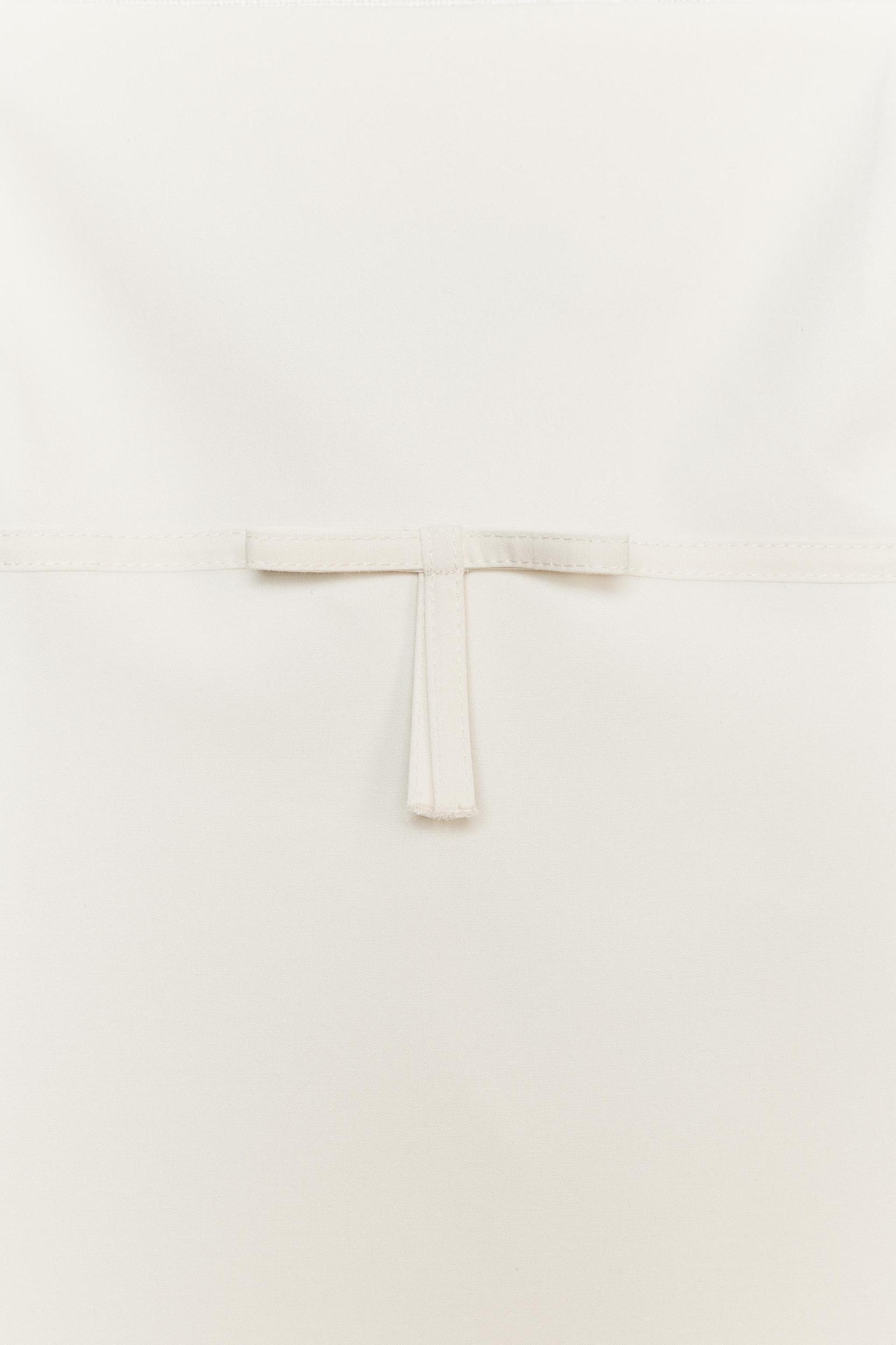 BOW STRAPLESS TOP Product Image