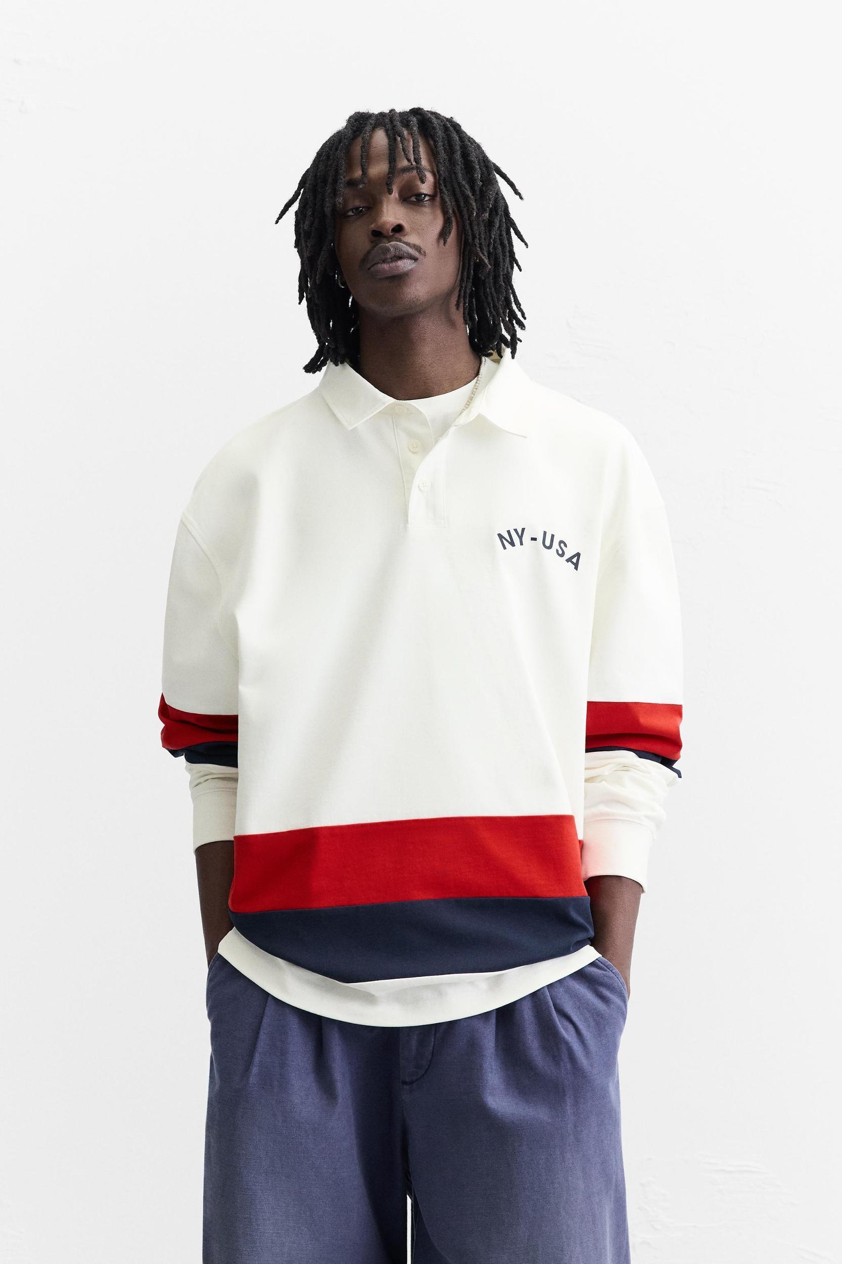 POLO WITH CONTRASTING SIDE STRIPE Product Image