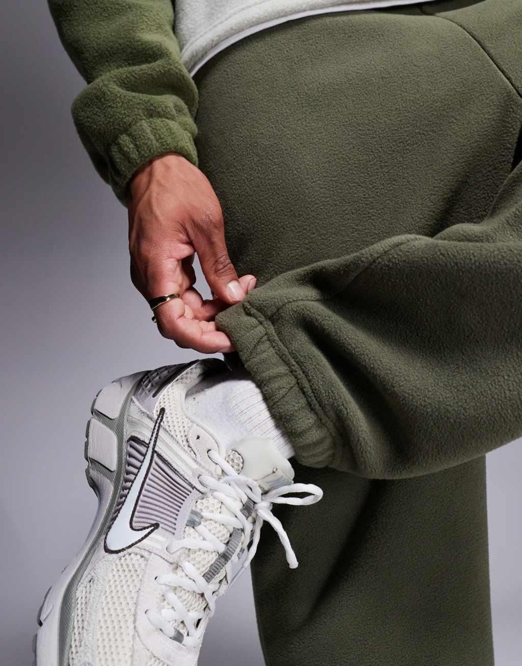 ASOS DESIGN tapered fleece sweatpants in khaki Product Image