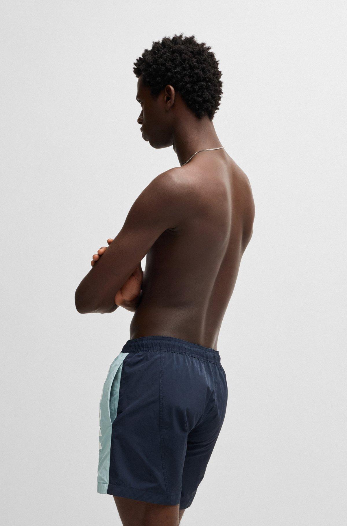 HUGO - Color-blocked swim shorts with two-tone logo - Dark Blue Product Image