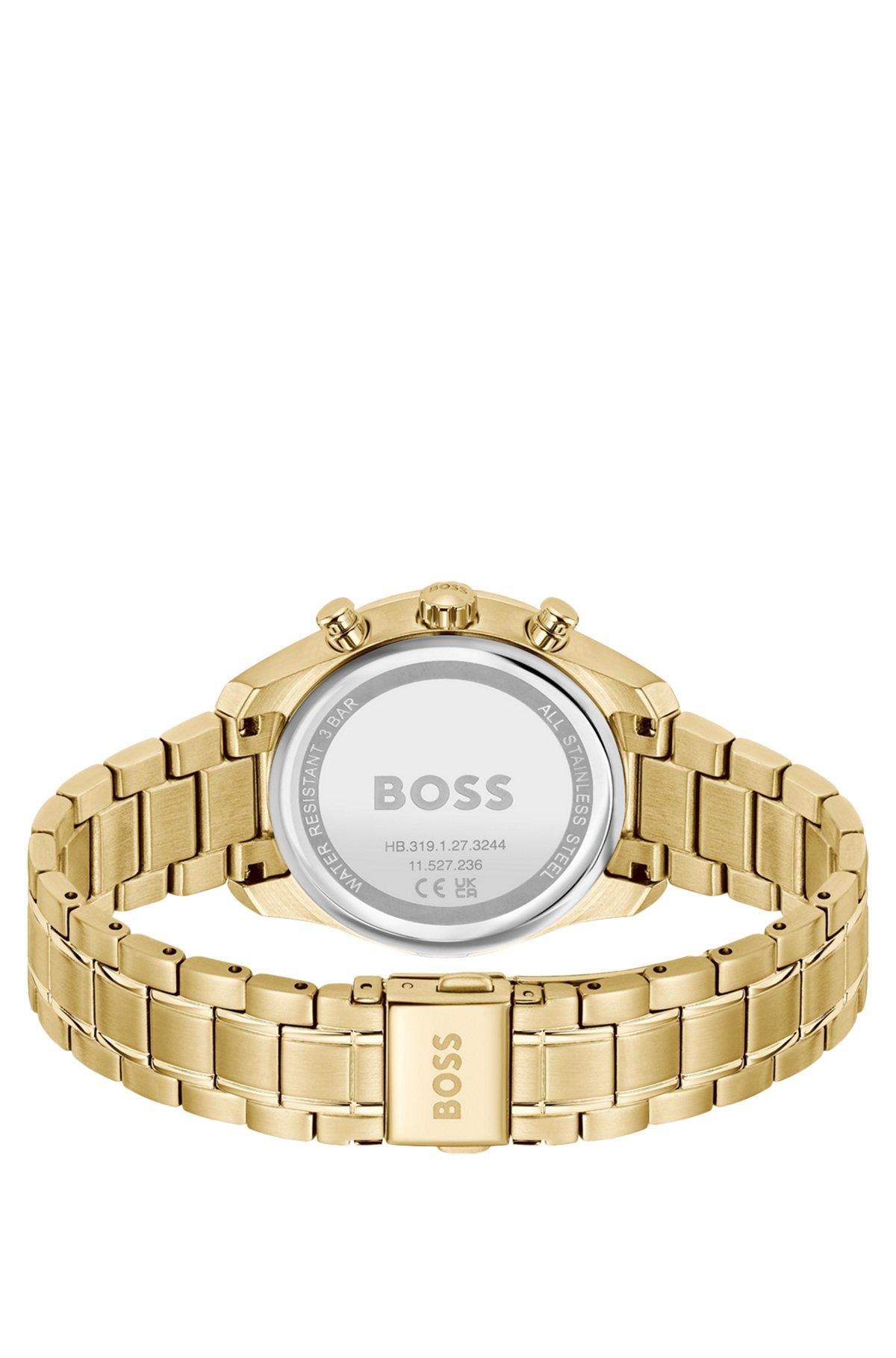 Gold-tone watch with monogram-textured dial Product Image
