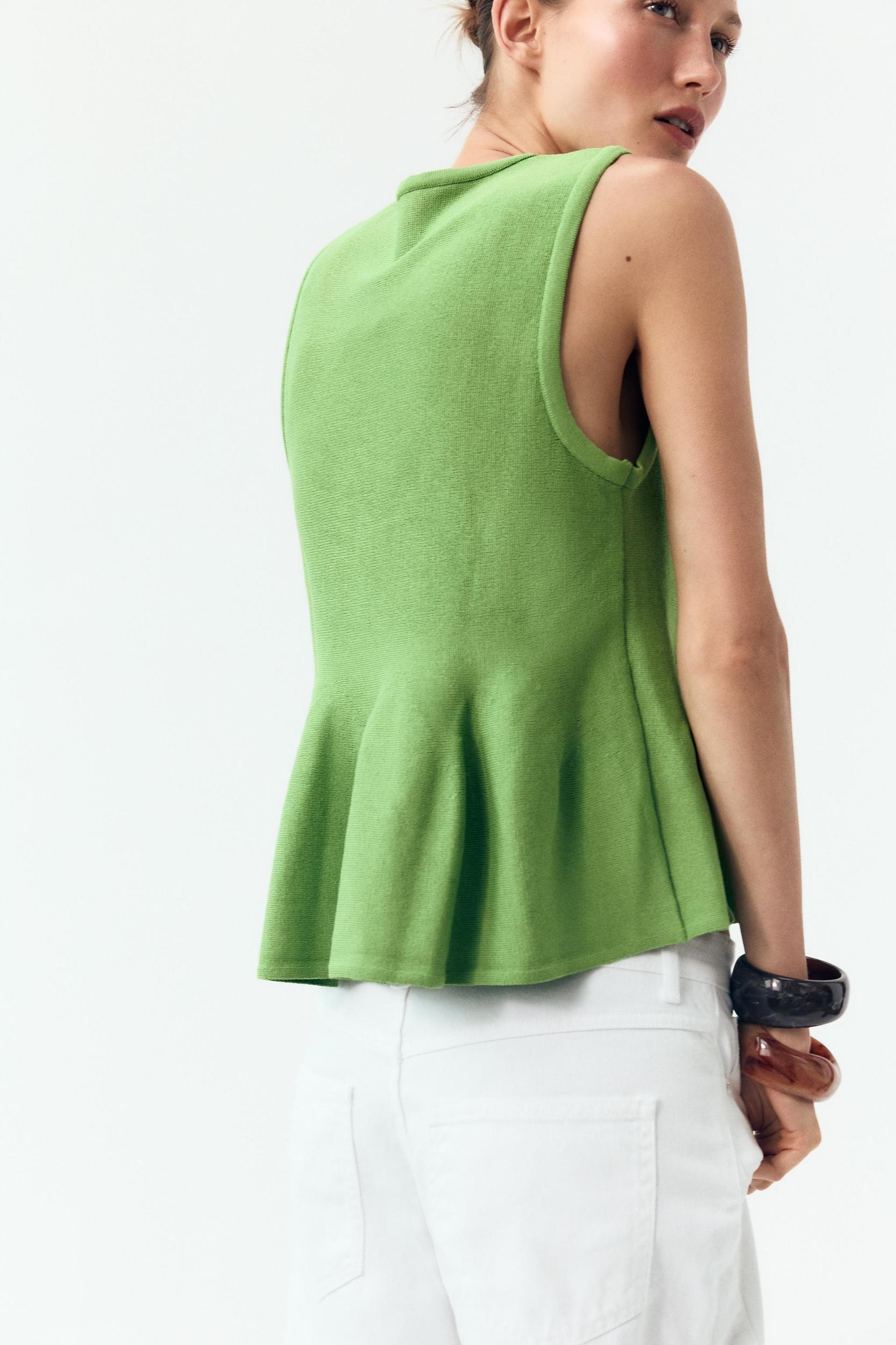 KNIT PEPLUM TOP Product Image