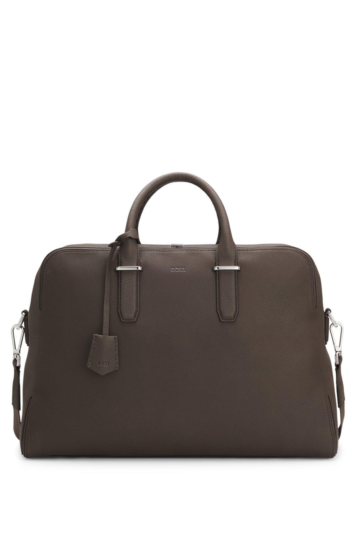 Grained-leather holdall with embossed logo Product Image