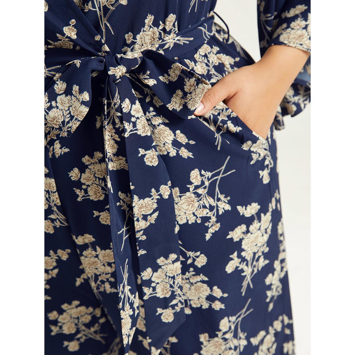 Plus Size DarkBlue Floral Print Bell Sleeve Pocket Belted Jumpsuit Women Elegant Elbow-length sleeve V-neck Dailywear Loose Jumpsuits BloomChic 30/6X Product Image