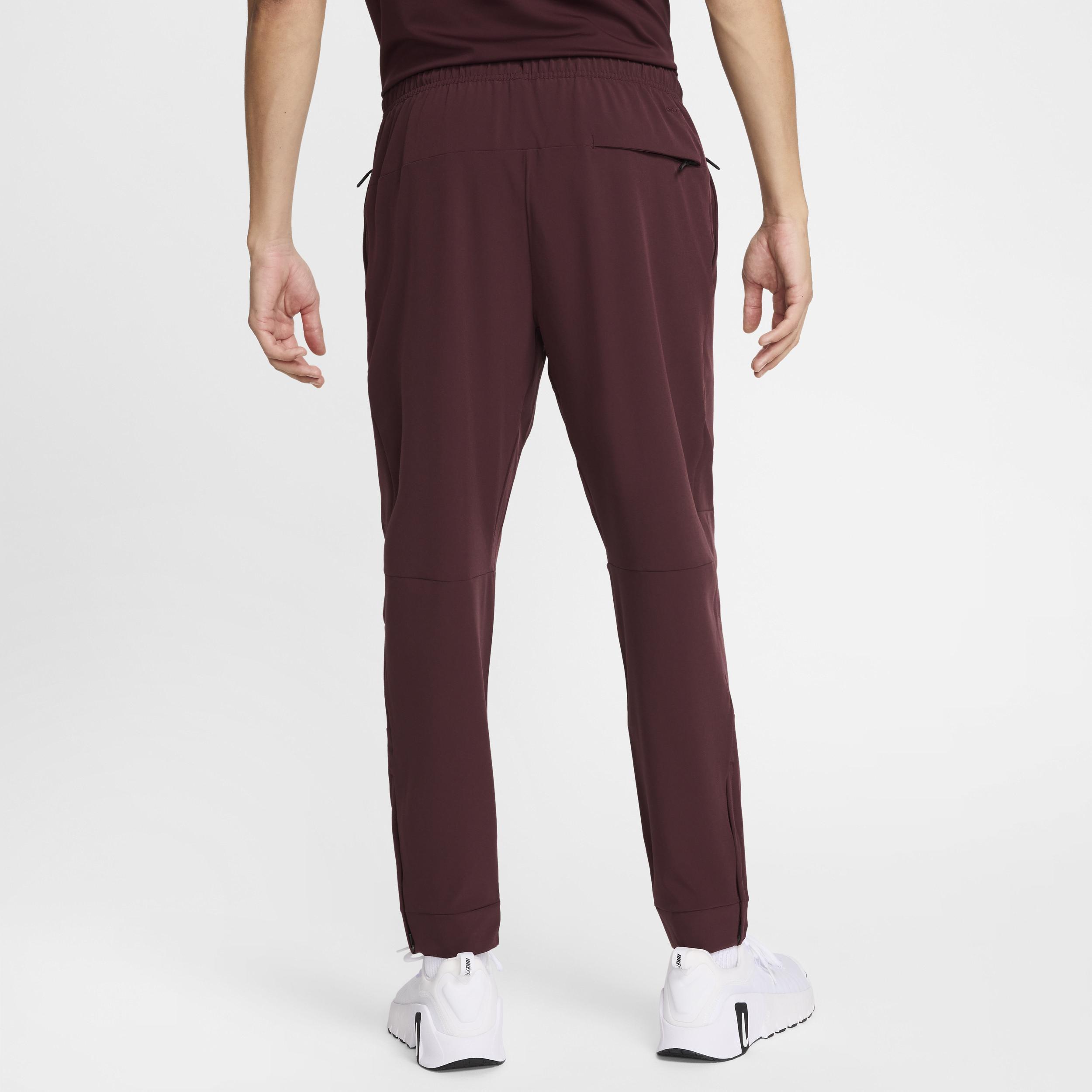 Nike Men's Unlimited Dri-FIT Zippered Cuff Versatile Pants Product Image