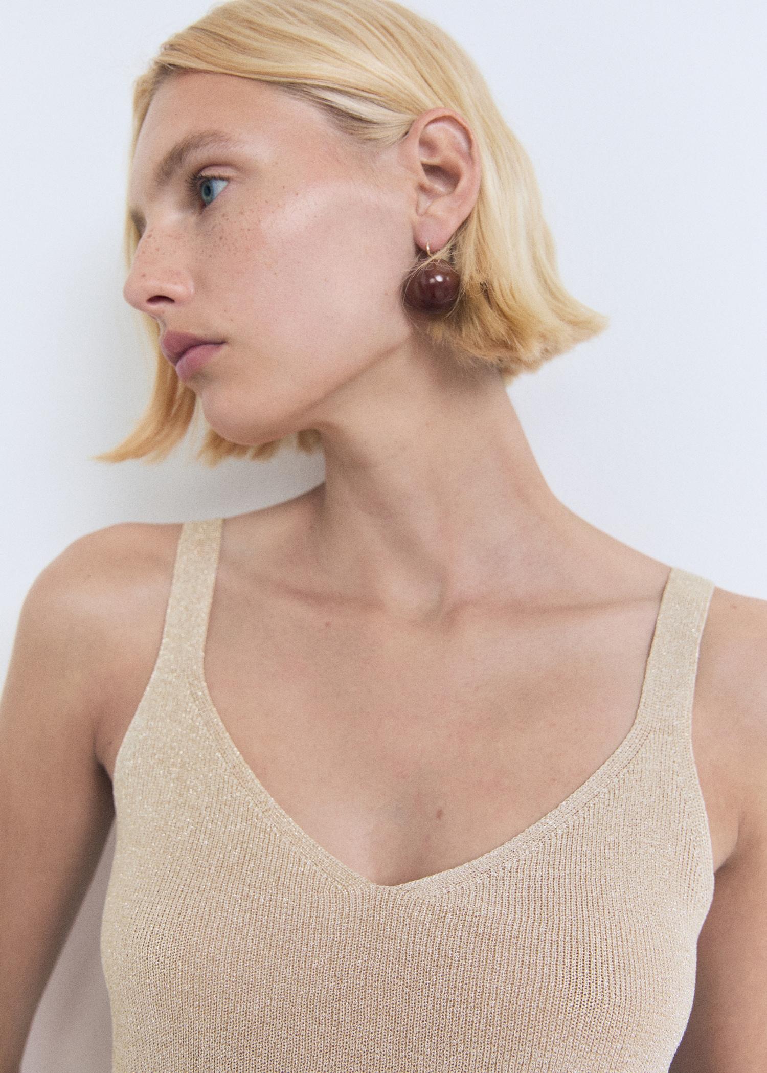 Lurex knitted V-neck top - Women | MANGO USA Product Image