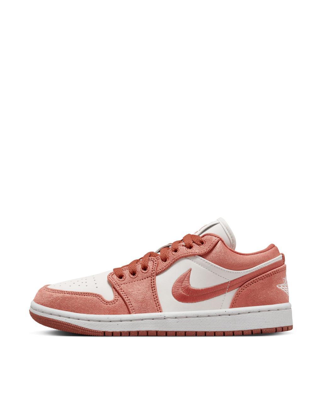 Nike Air Jordan 1 Low SE sneakers in orange & white Product Image