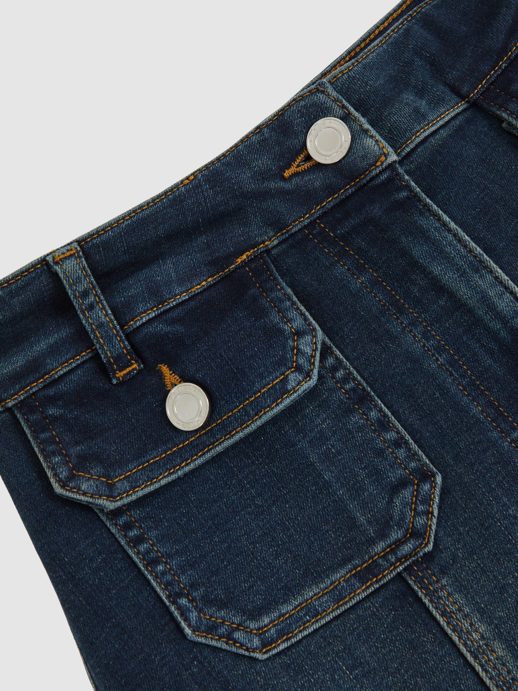 Button-Pocket Flared Jeans in Mid Blue Product Image