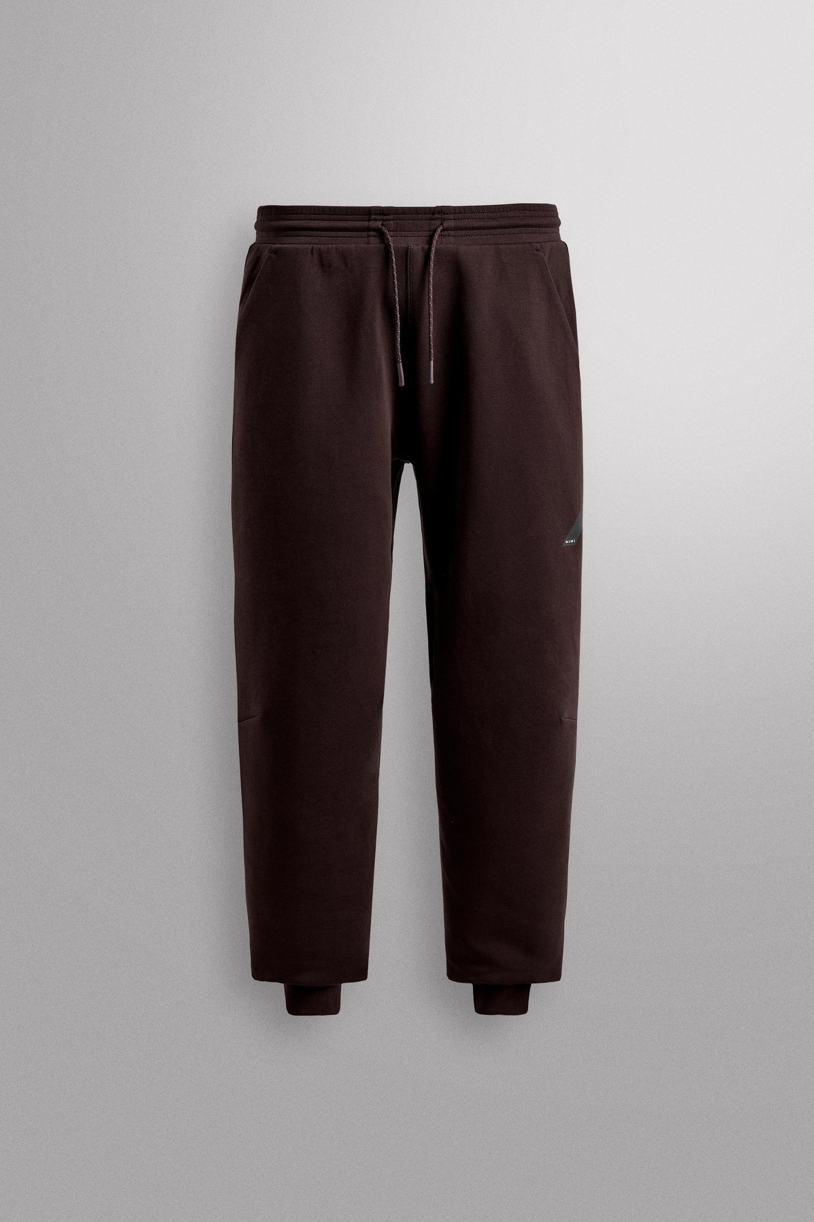 TECHNICAL ZIPPER PANTS Product Image