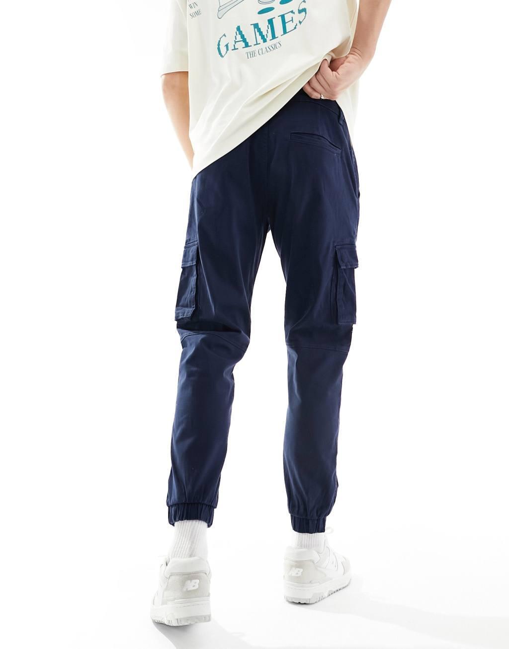 ONLY & SONS tapered fit cargo pants with cuffed bottoms in navy Product Image