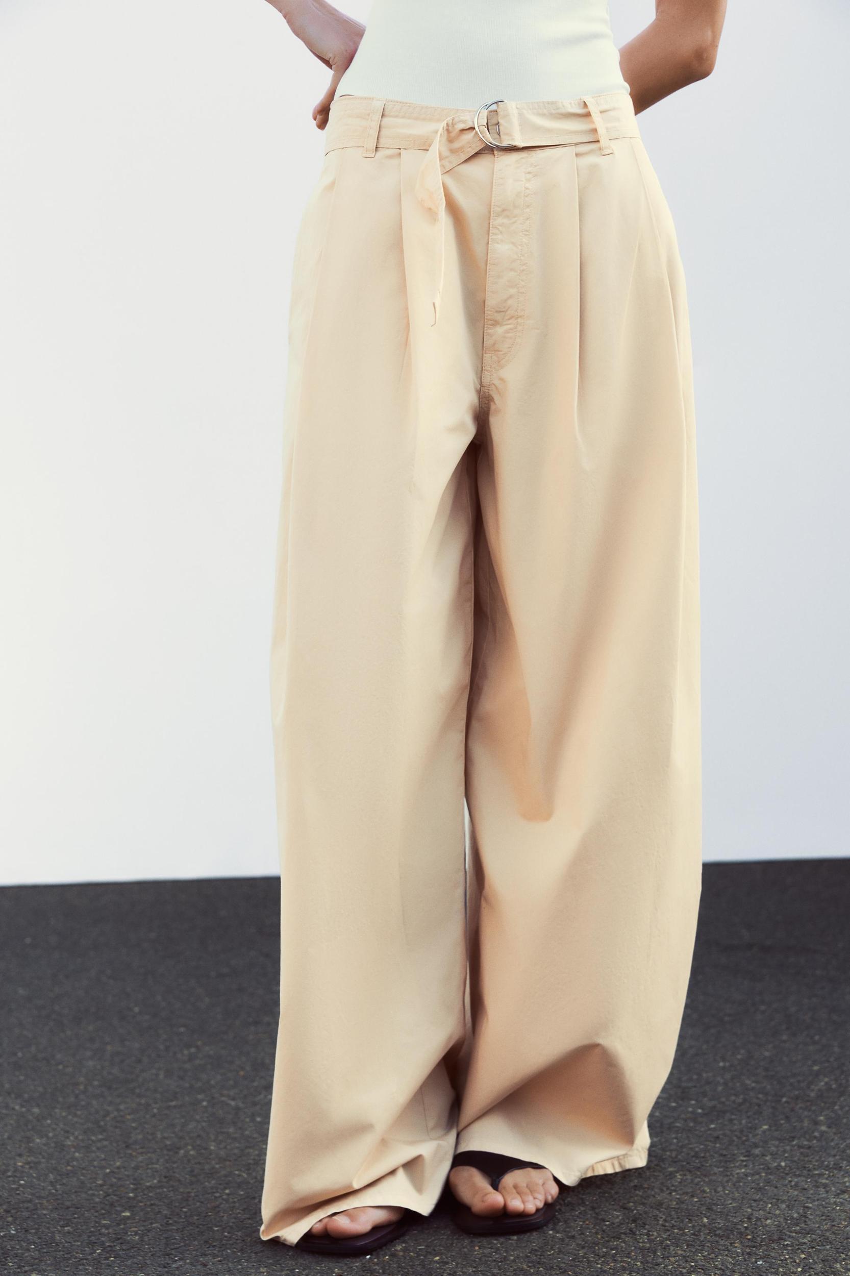 PLEATED BELTED PANTS Product Image