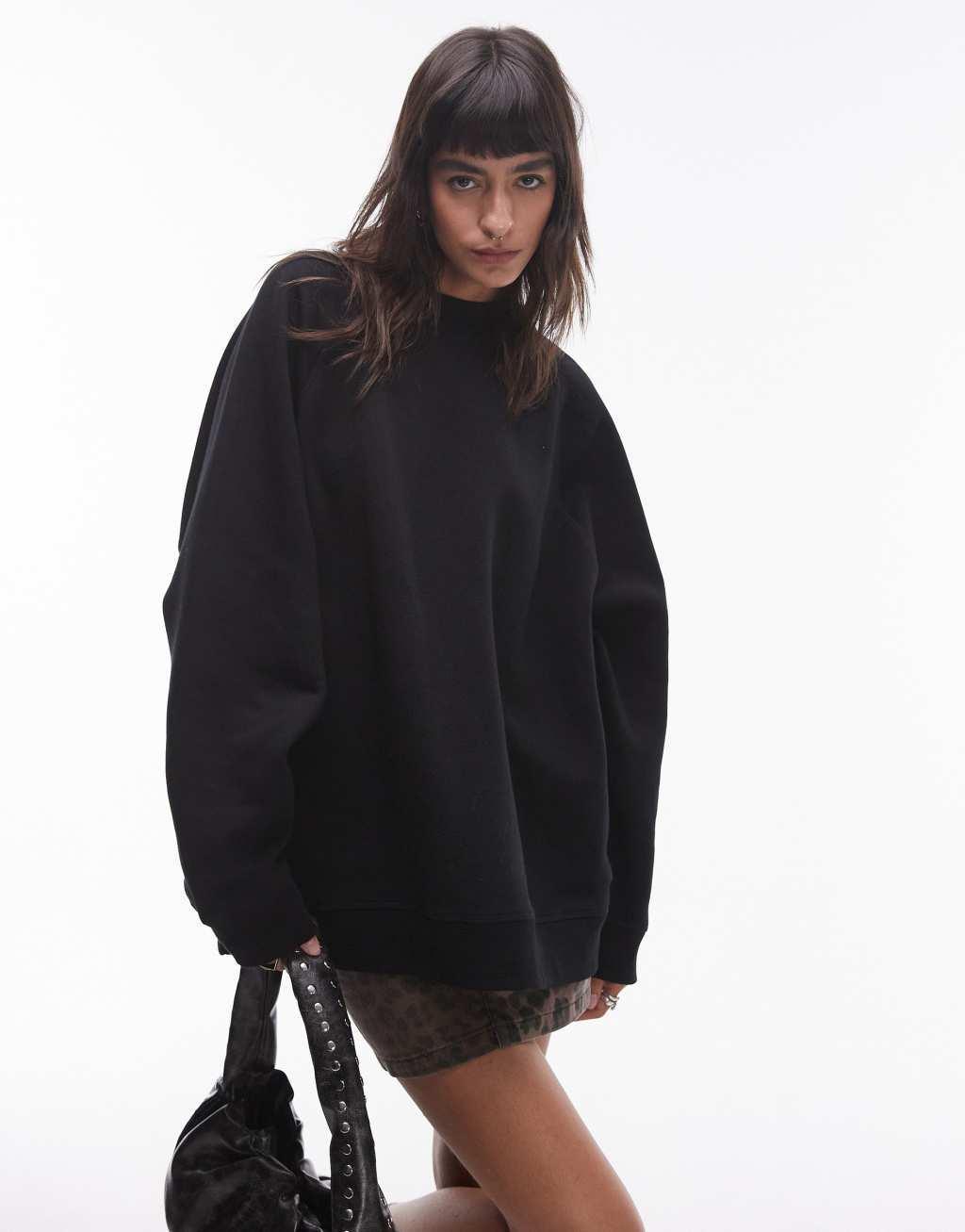 Topshop raglan oversized sweatshirt in black Product Image