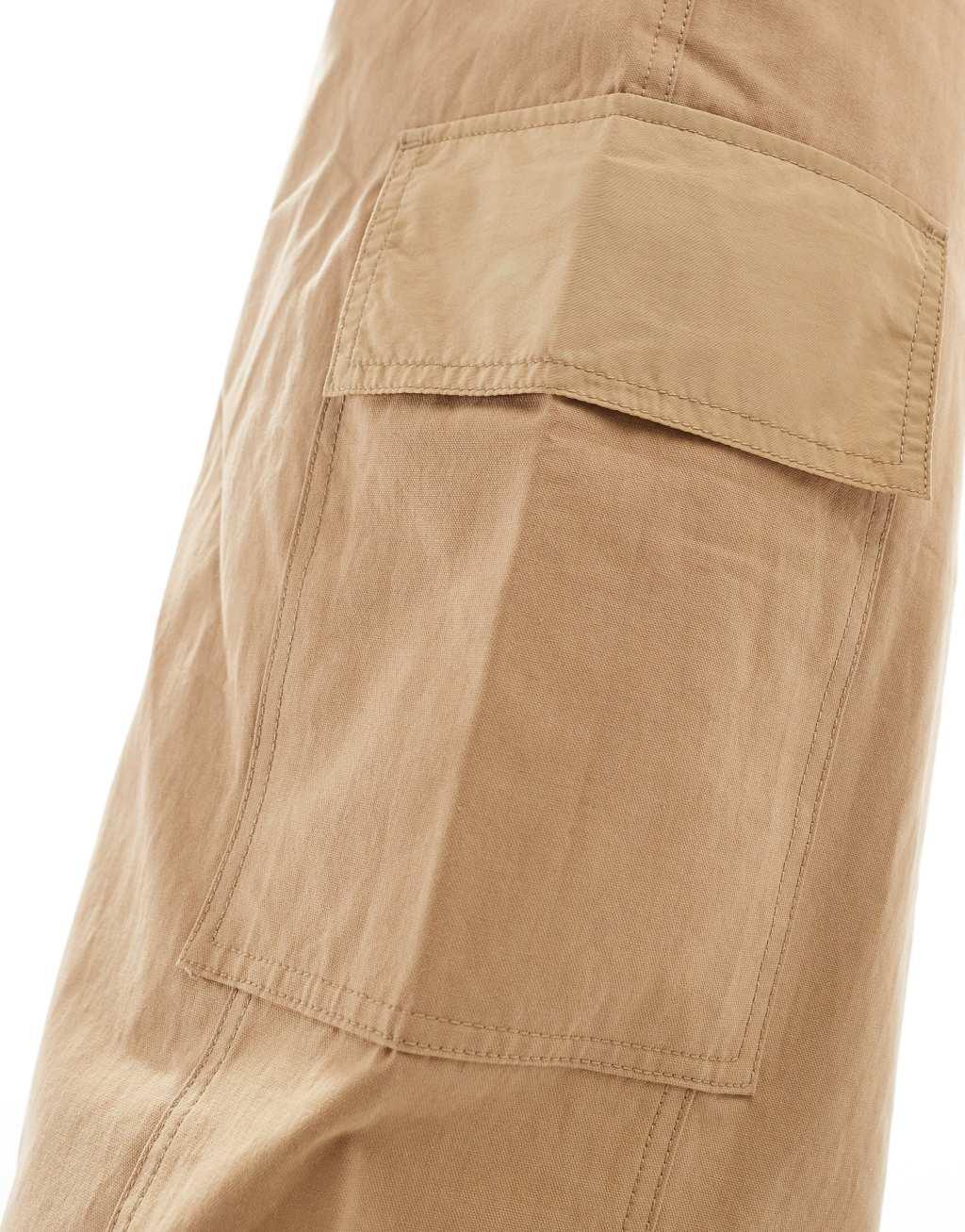 ASOS DESIGN loose fit cargo pants with seam detail in tan Product Image