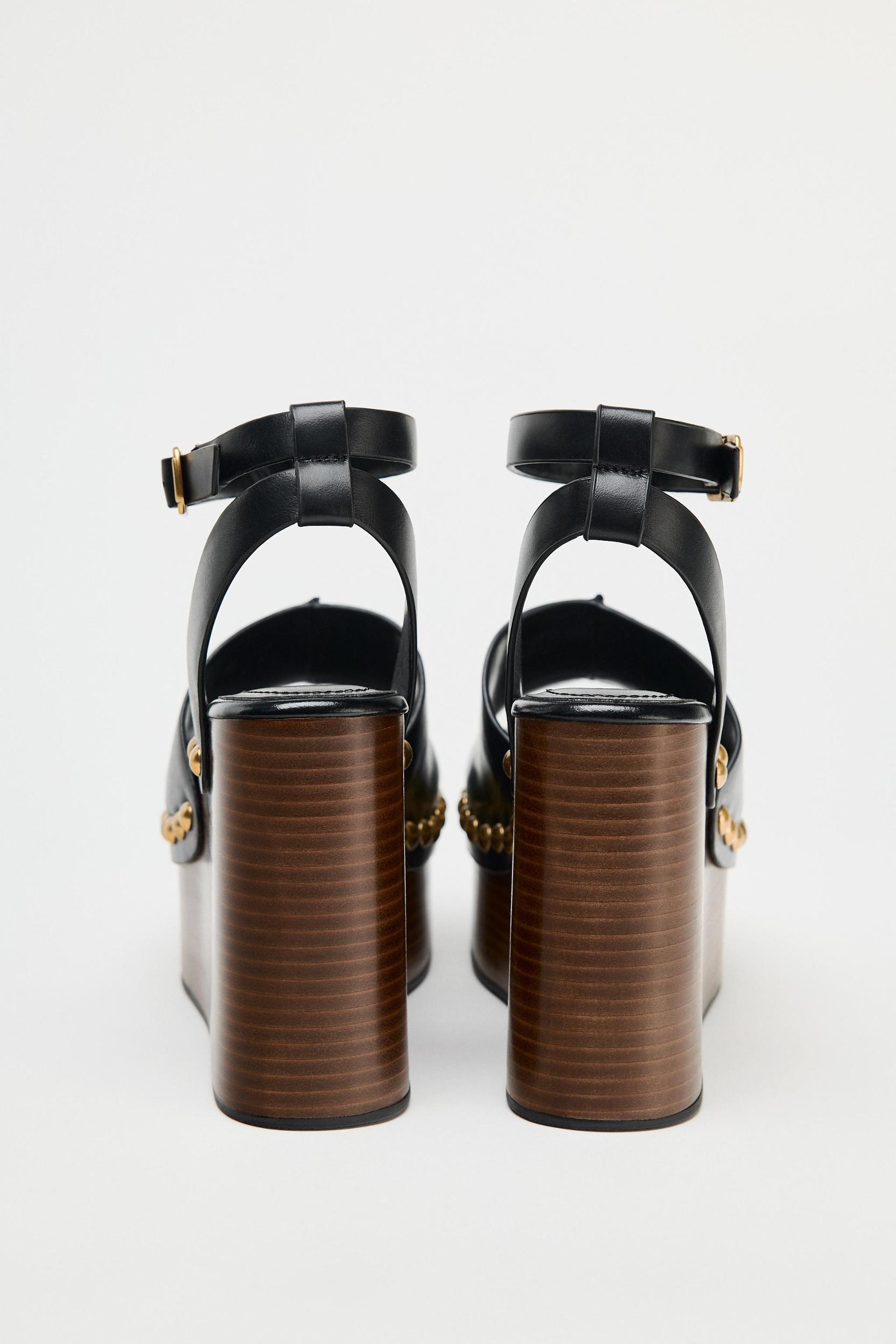 STUDDED LEATHER WEDGE SANDALS Product Image