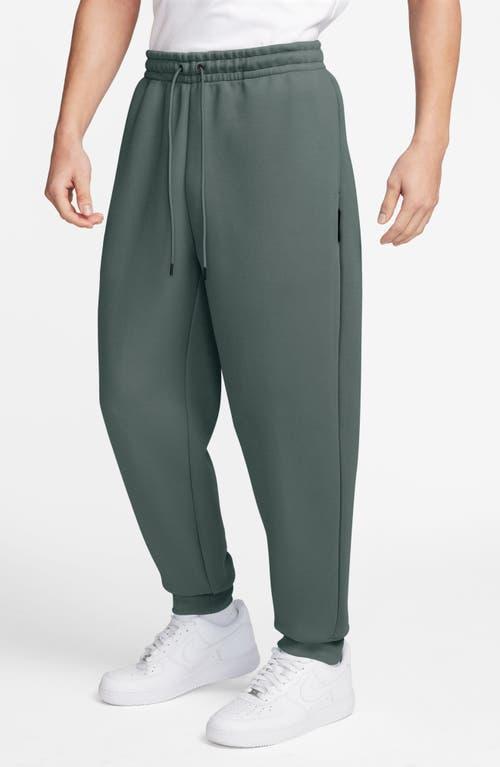 NIKE Men's Tech Fleece Pants In Green Product Image