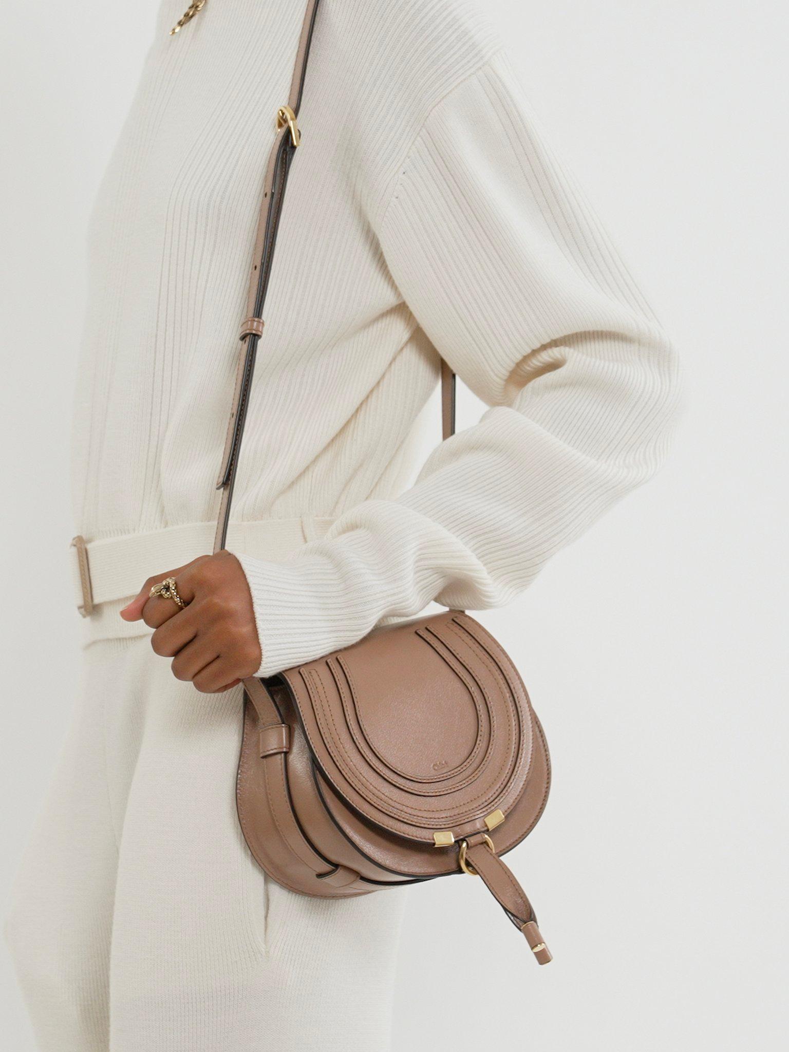 Small Marcie saddle bag in shiny leather Product Image