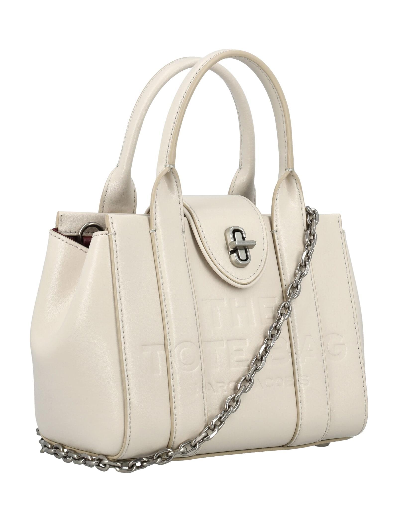 MARC JACOBS The Mini Tote Turn Lock Bag In Cloud White Product Image