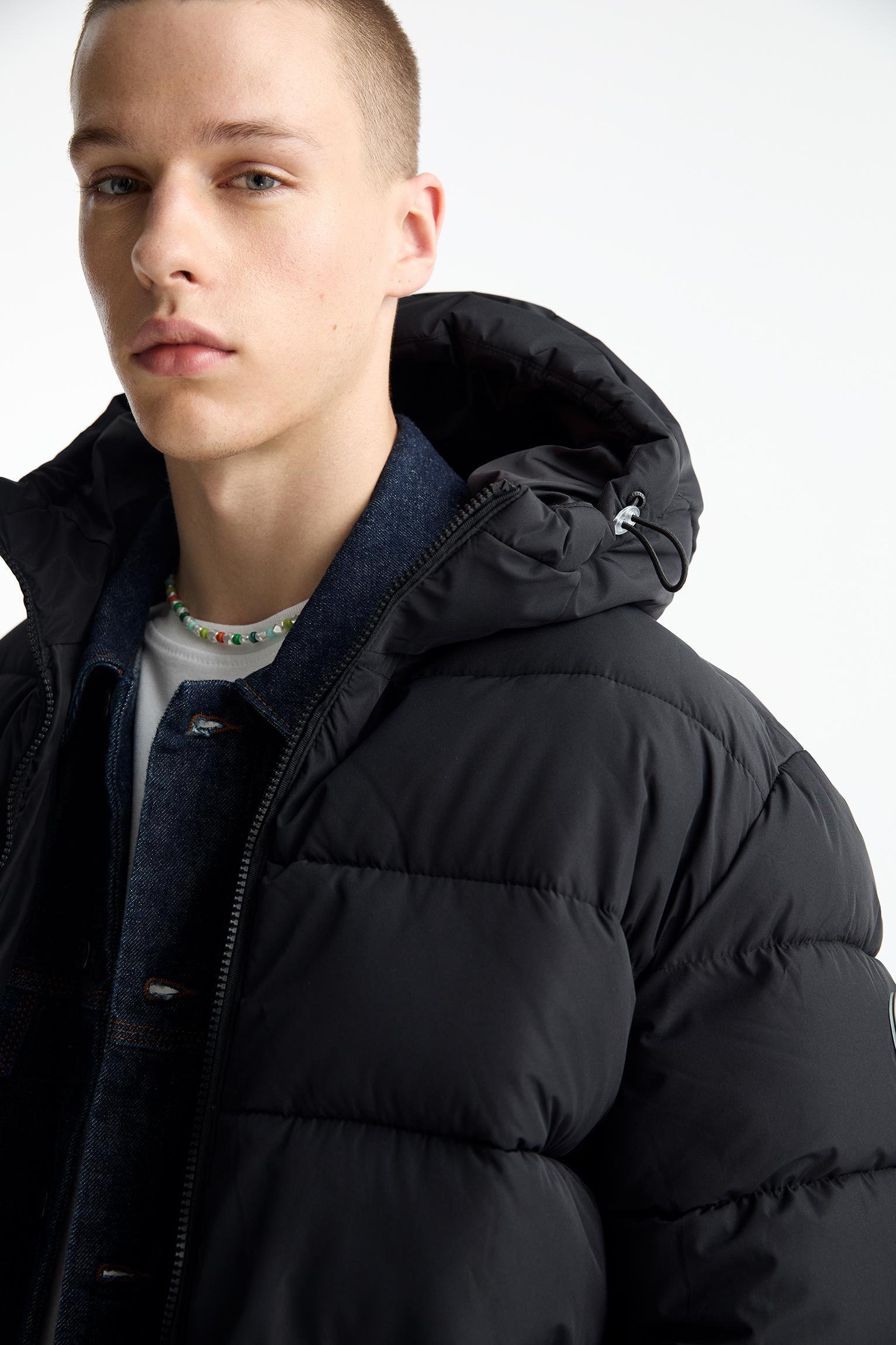 Lightweight puffer jacket with hood Product Image