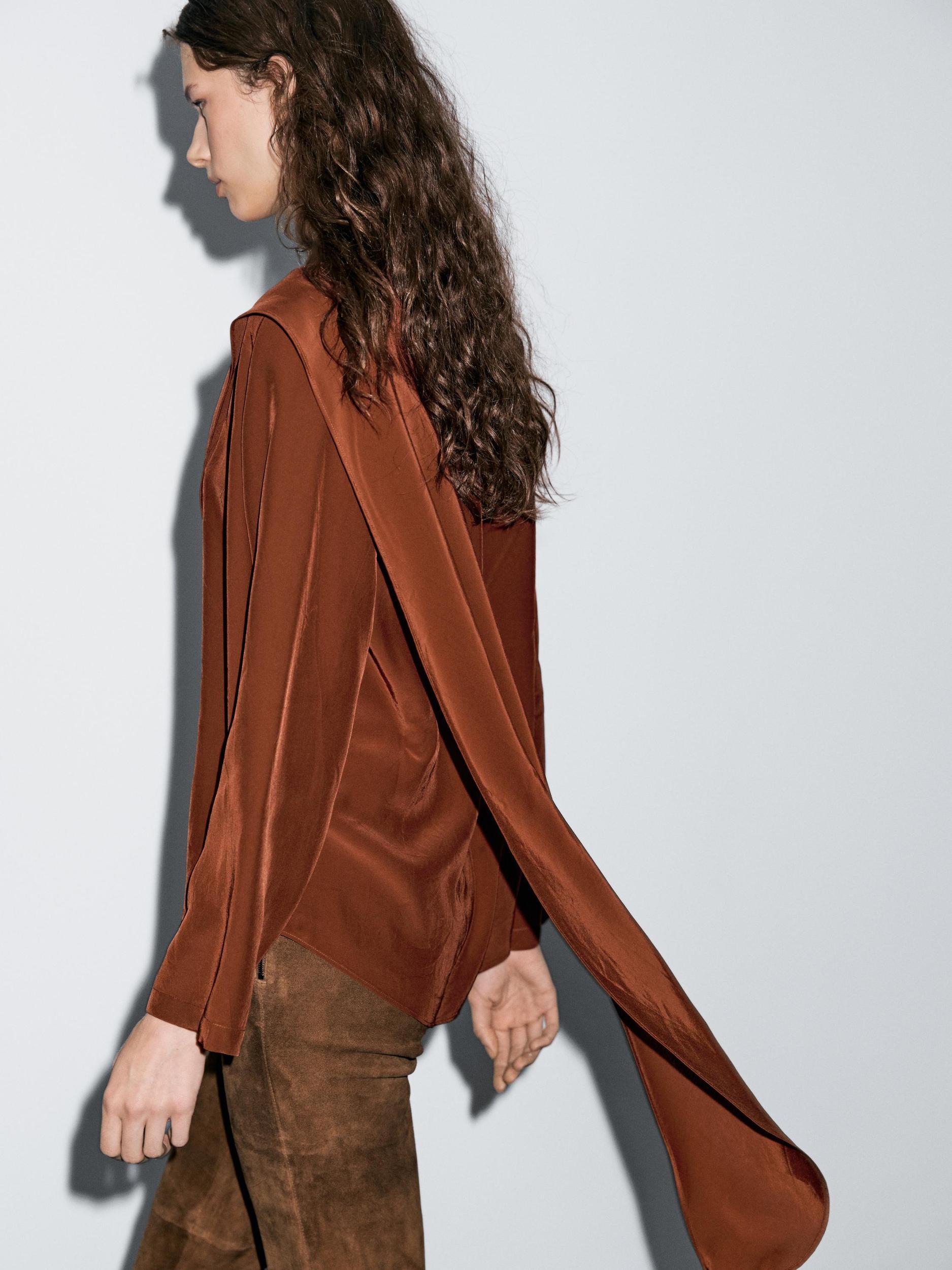 Flowing blouse with tied neck Product Image