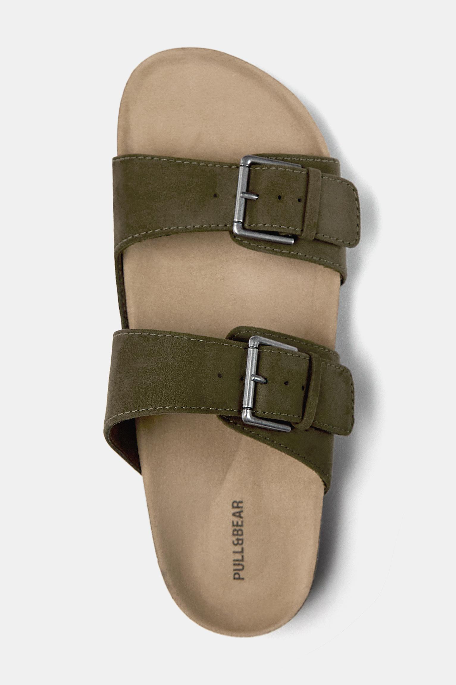 Flat sandals with buckles Product Image