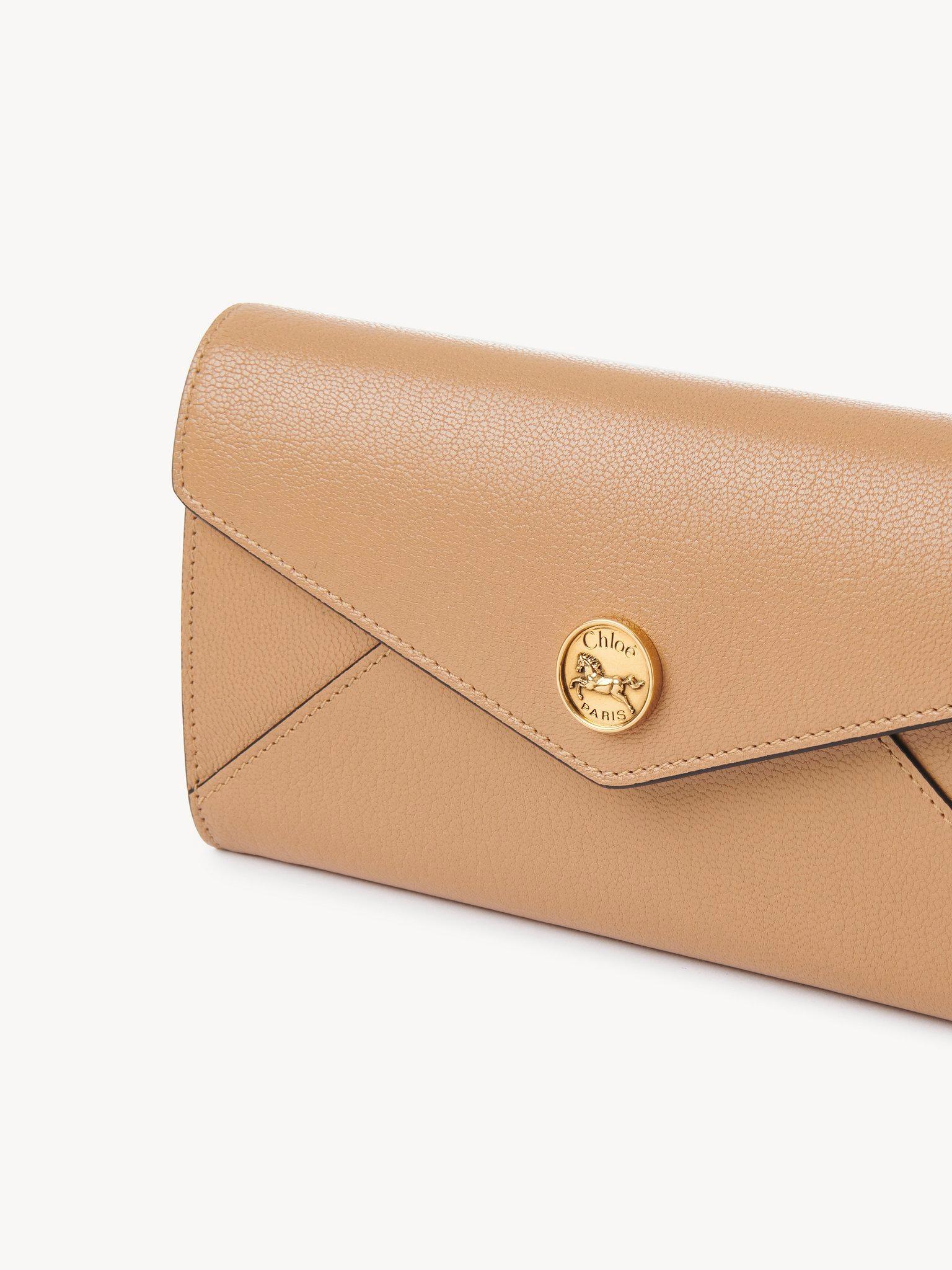 Envelope long wallet with flap in grained leather Product Image